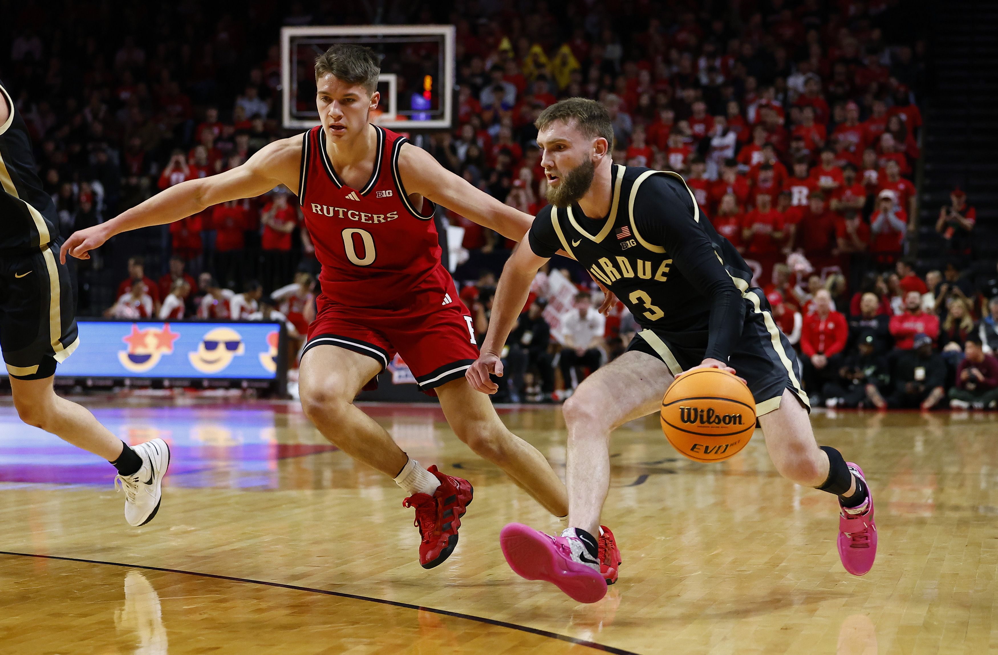 Purdue guard Braden Smith (3) drives to the basket against Rutgers guard Jordan Derkack (0) during the first half of an NCAA college basketball game, Thursday, Jan. 9, 2025, in Piscataway, N.J. 