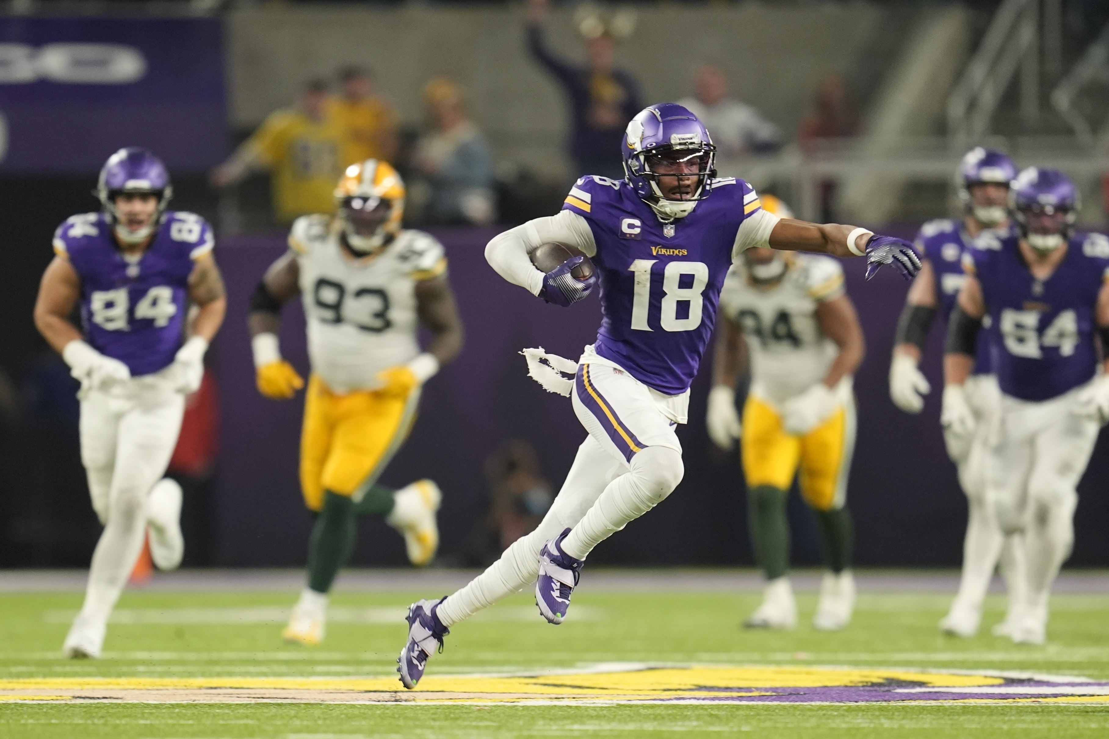 Minnesota Vikings' Justin Jefferson catches a pass for a first down during the second half of an NFL football game against the Green Bay Packers Sunday, Dec. 29, 2024, in Minneapolis.