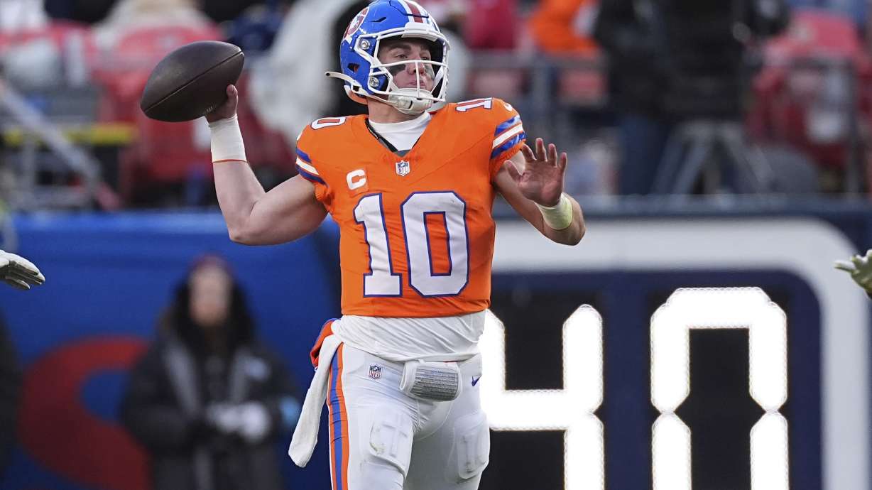 Denver Broncos quarterback Bo Nix (10) throws during the second half of an NFL football game against the Kansas City Chiefs Sunday, Jan. 5, 2025, in Denver.