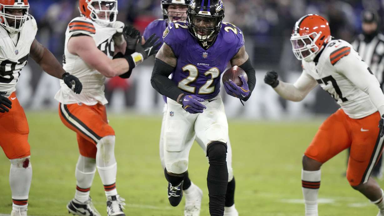 Baltimore Ravens running back Derrick Henry (22) scores on a 43-yard touchdown run during the second half of an NFL football game against the Cleveland Browns Saturday, Jan. 4, 2025, in Baltimore.