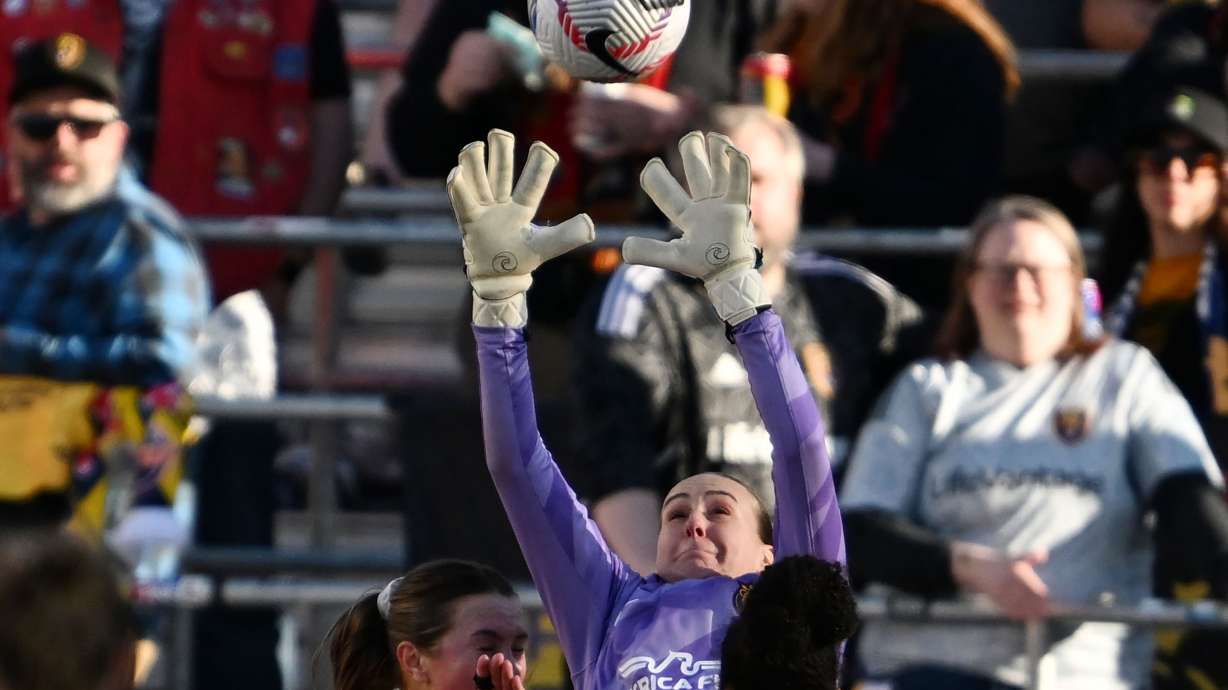 Utah Royals’ keeper Carly Nelson jumps for the ball near the goal as the Utah Royals and Chicago Red Stars play at America First Field in Sandy on Saturday, March 16, 2024.
