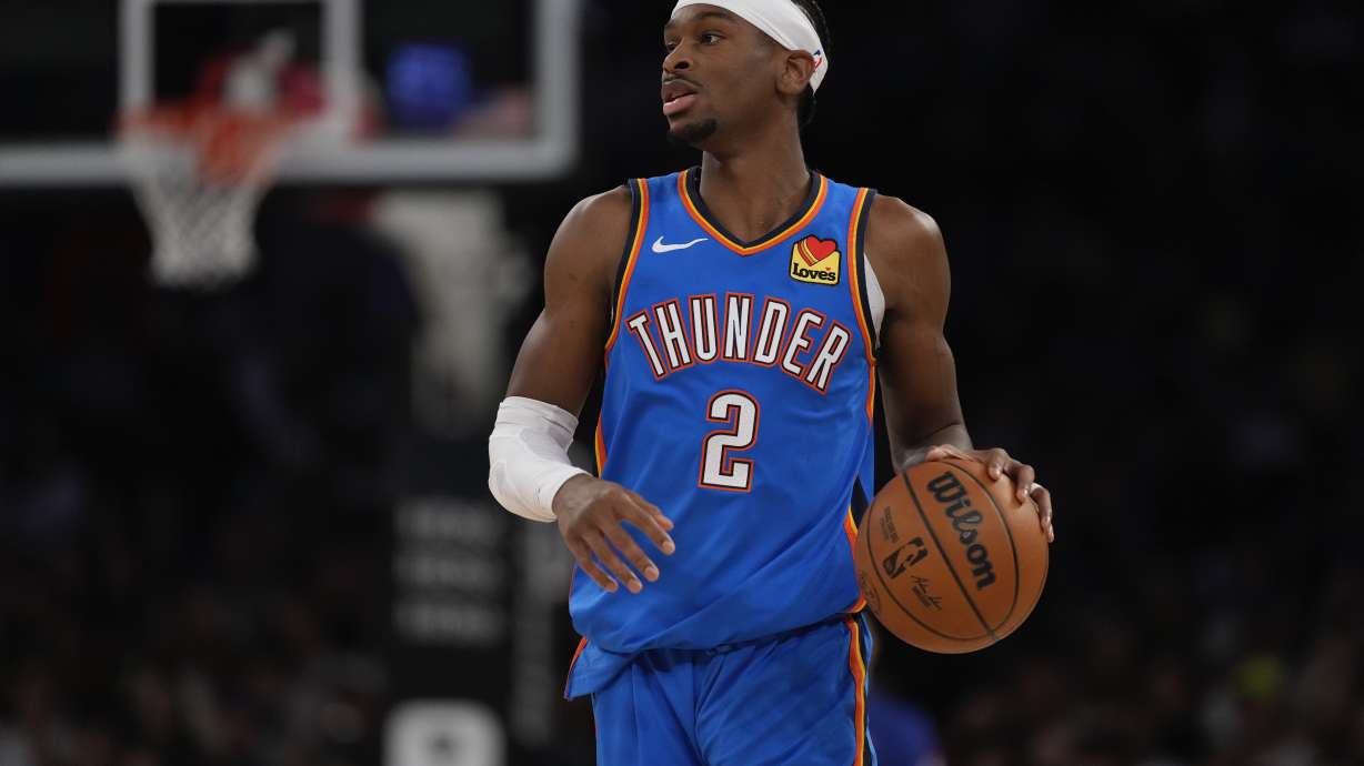 Oklahoma City Thunder's Shai Gilgeous-Alexander (2) looks to pass during the first half of an NBA basketball game against the New York Knicks, Friday, Jan. 10, 2025, in New York.