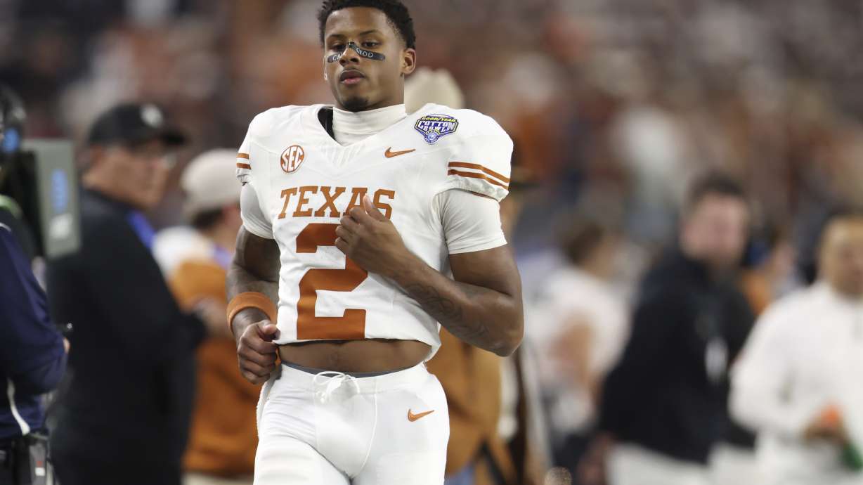Texas wide receiver Matthew Golden (2) jogs on the sideline during the second half of the Cotton Bowl College Football Playoff semifinal game against Ohio State, Friday, Jan. 10, 2025, in Arlington, Texas.