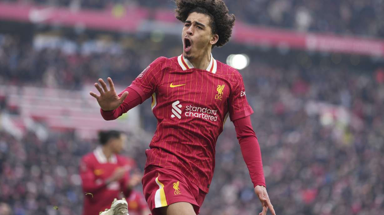 Liverpool's Jayden Danns celebrates after scoring his side's third goal during the FA Cup soccer match between Liverpool and Accrington Stanley at the Anfield stadium in Liverpool, England, Saturday, Jan. 11, 2025.