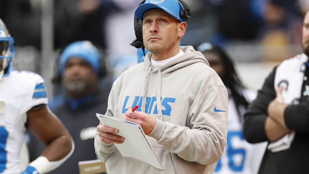 FILE - Detroit Lions offensive coordinator Ben Johnson looks on from the sidelines during the first half of an NFL football game against the Chicago Bears, Dec. 22, 2024, in Chicago.