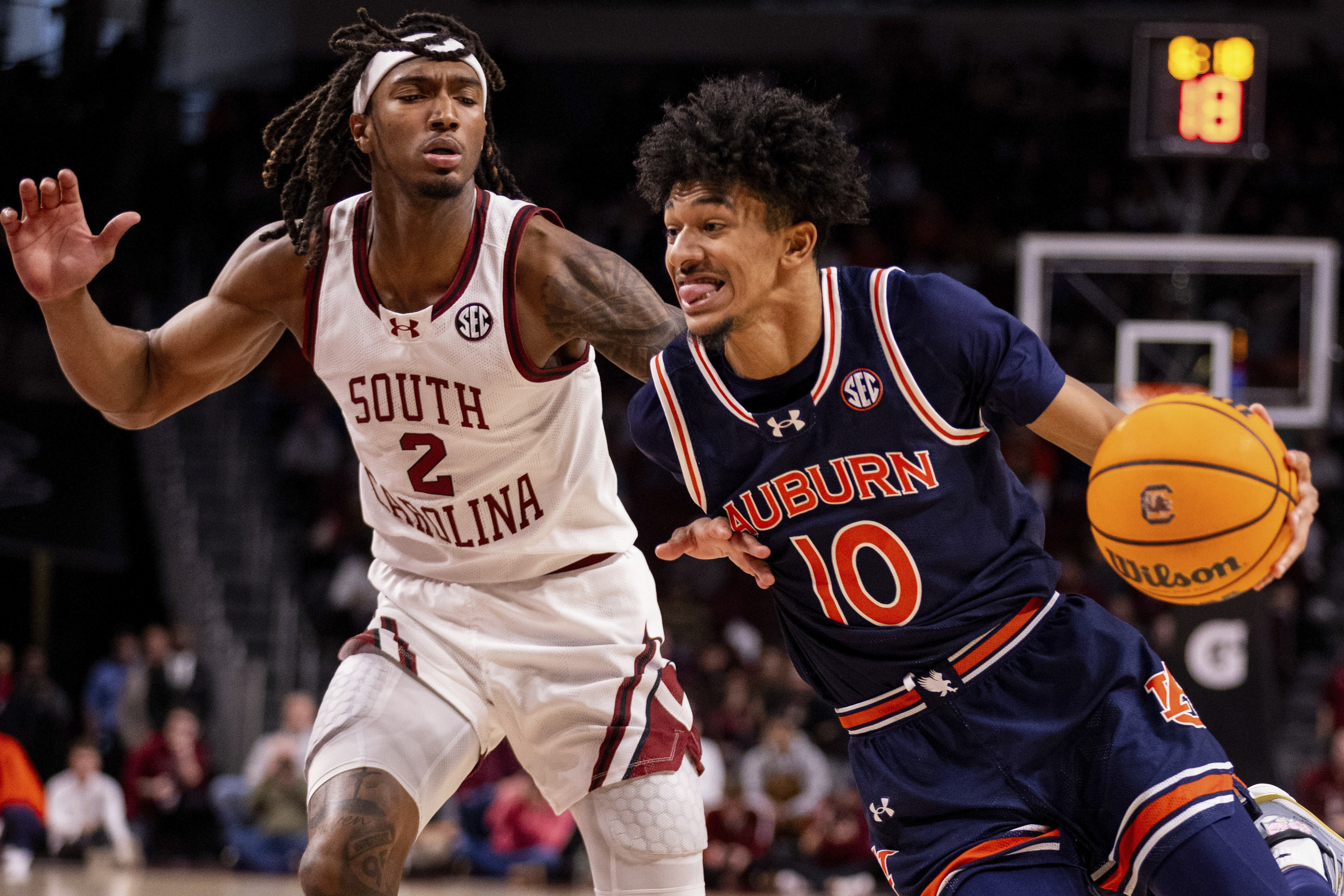 Auburn guard Chad Baker-Mazara (10) drives past South Carolina guard Zachary Davis (2) during the first half of an NCAA college basketball game on Saturday, Jan. 11, 2025, in Columbia, S.C. 