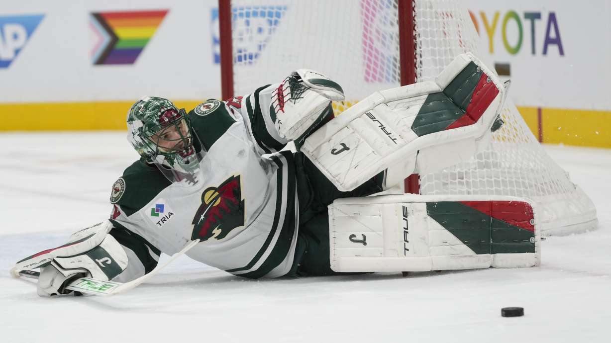 Minnesota Wild goaltender Marc-Andre Fleury defends against a shot by the San Jose Sharks during the first period of an NHL hockey game in San Jose, Calif., Saturday, Jan. 11, 2025.
