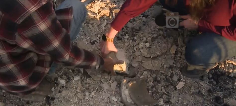 Man sifts through the debris of his burned home to find urn holding his late wife's ashes