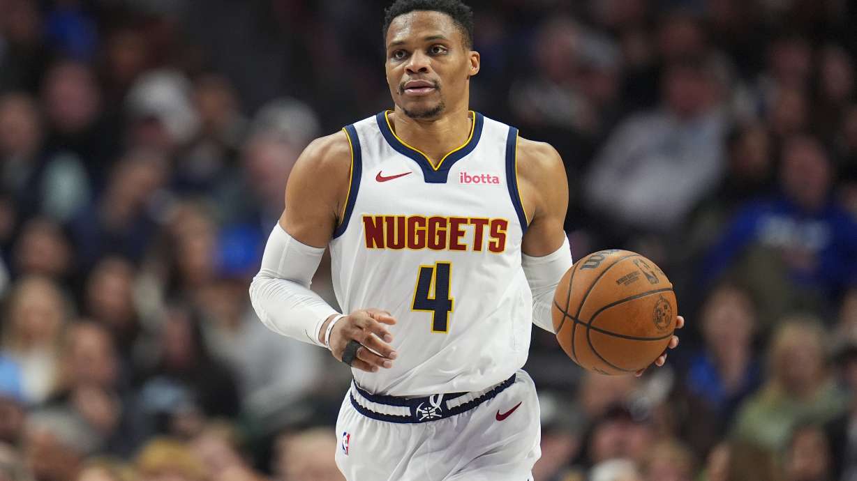 Denver Nuggets guard Russell Westbrook dribbles up court during the second half of an NBA basketball game against the Dallas Mavericks, Sunday, Jan. 12, 2025, in Dallas. The Nuggets won 112-101.