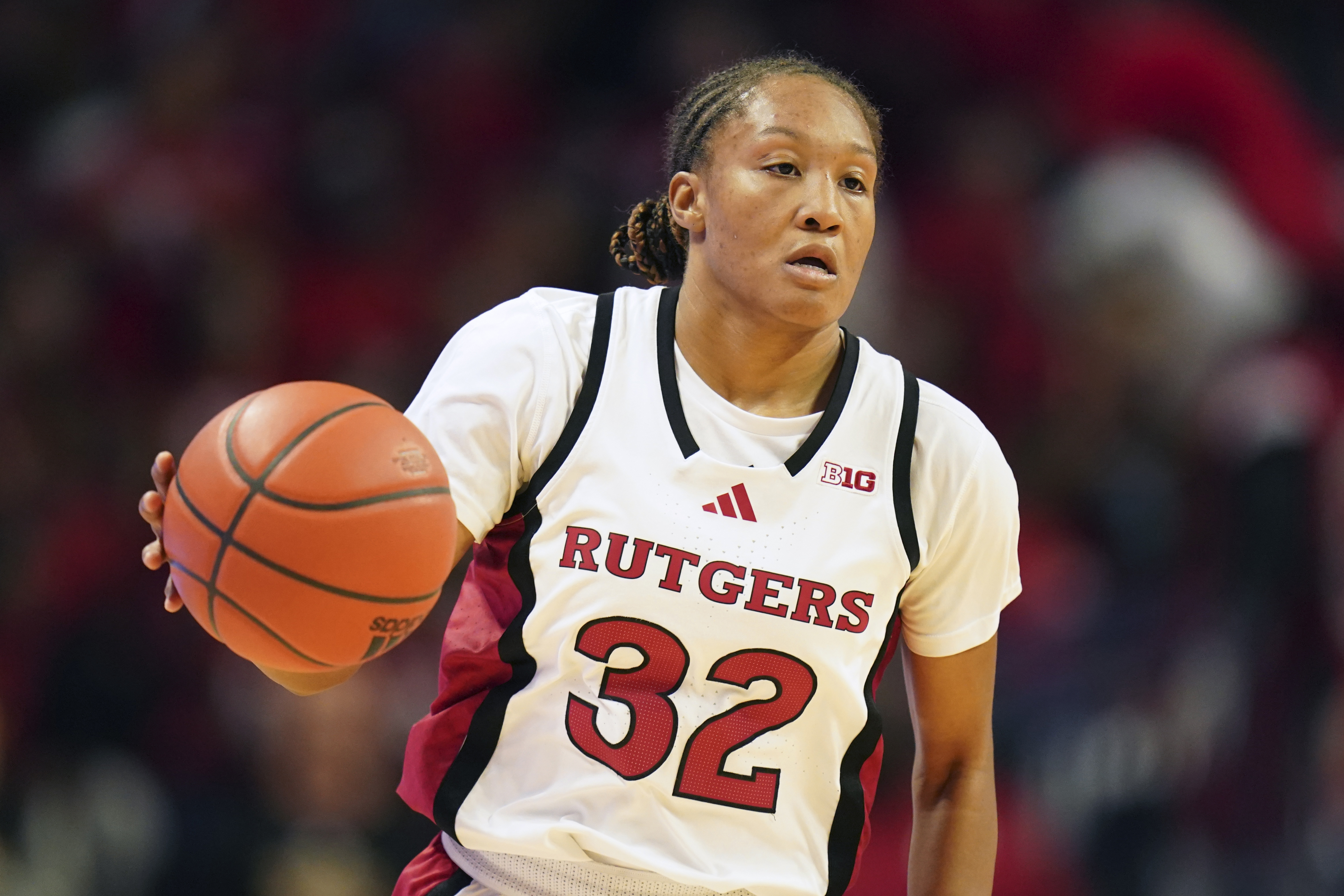 FILE - Rutgers guard Kiyomi McMiller (32) during an NCAA college basketball game against Iona, Nov. 15, 2024, in Piscataway, N.J.