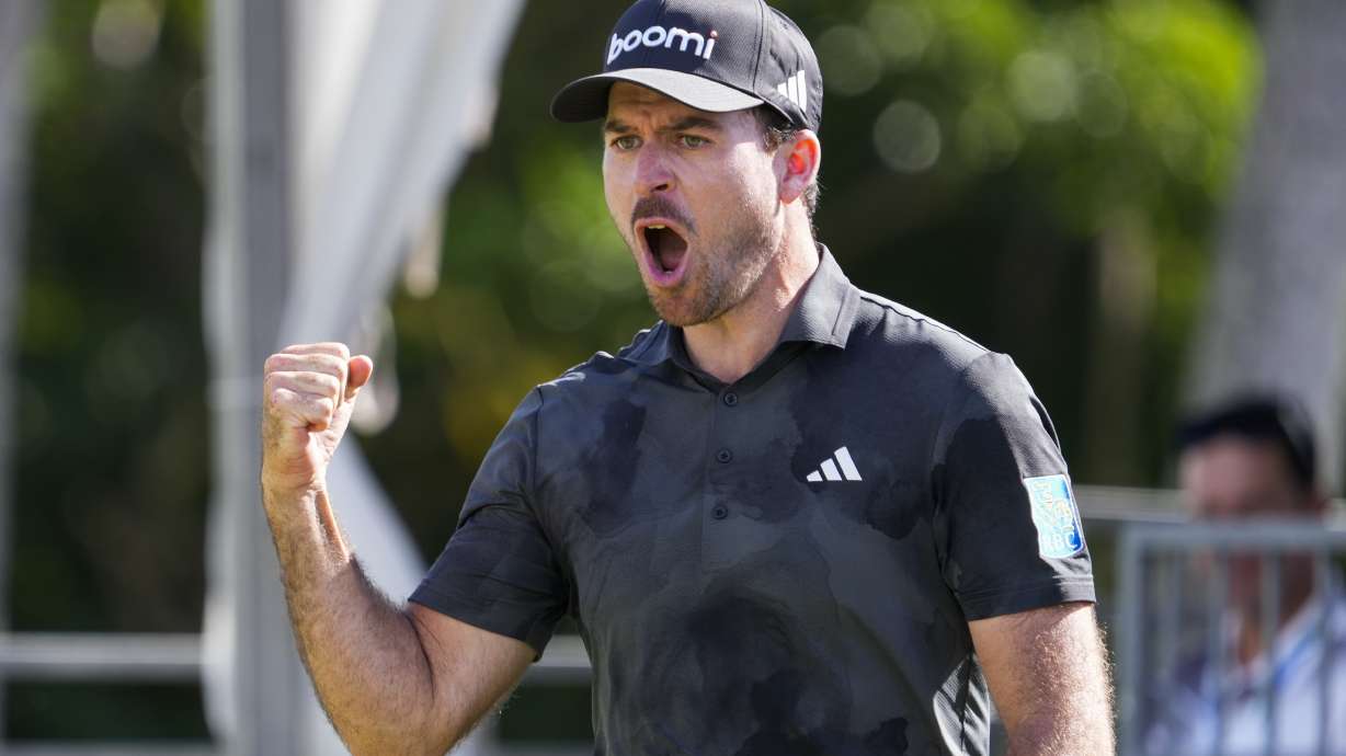 Nick Taylor, of Canada, celebrates after making a shot on the 18th green during the final round of the Sony Open golf event, Sunday, Jan. 12, 2025, at Waialae Country Club in Honolulu.