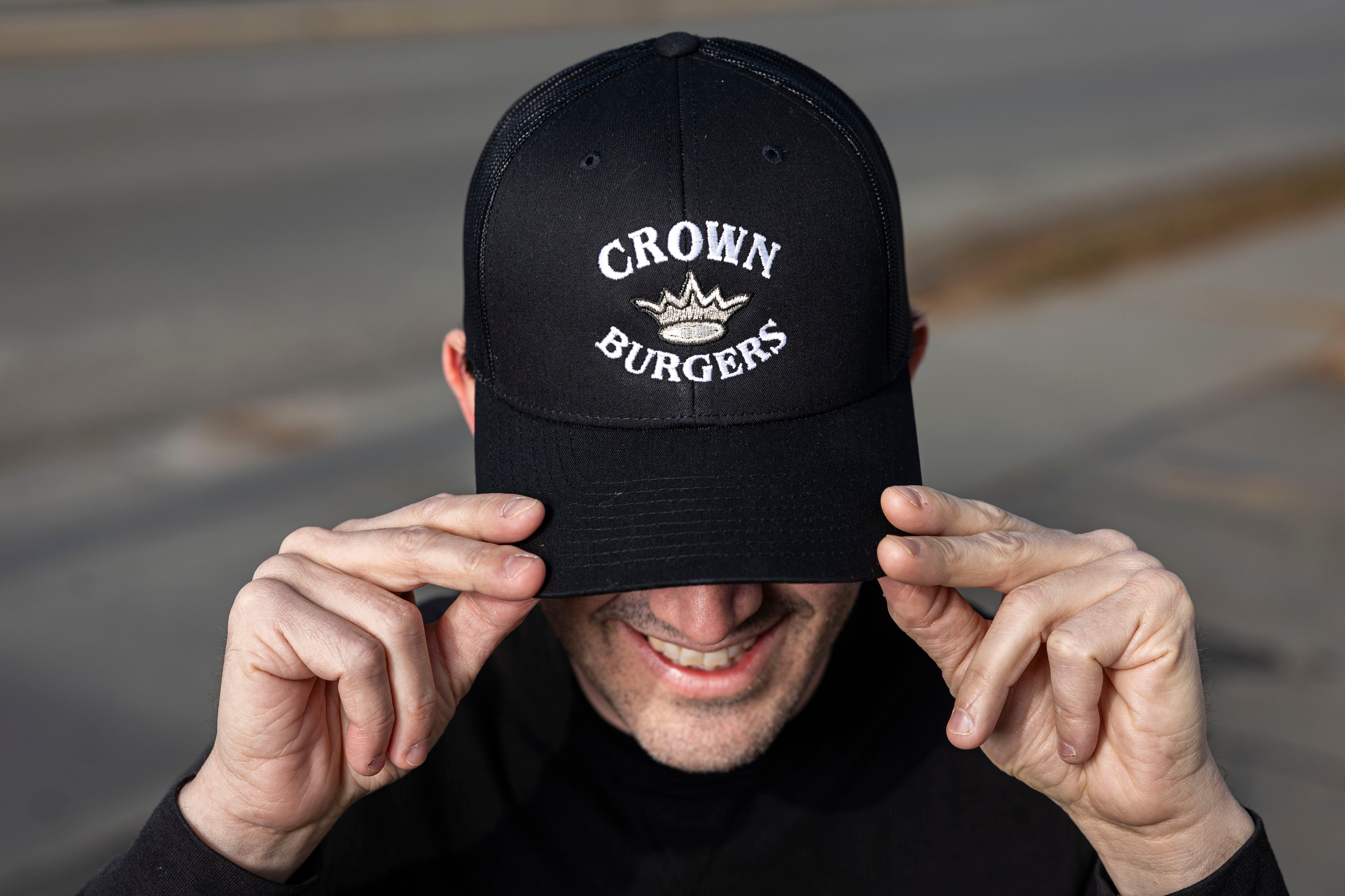 Bryant Heath poses in front of the Crown Burgers location at 118 N. 300 West in Salt Lake City on Jan. 10.