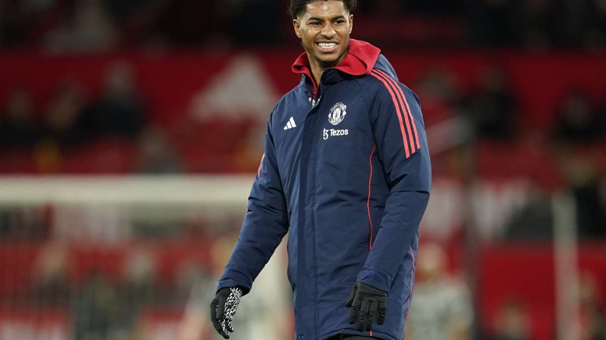 Manchester United's Marcus Rashford smiles during the warm up before the English Premier League soccer match between Manchester United and Newcastle at the Old Trafford stadium in Manchester, England, Monday, Dec. 30, 2024.