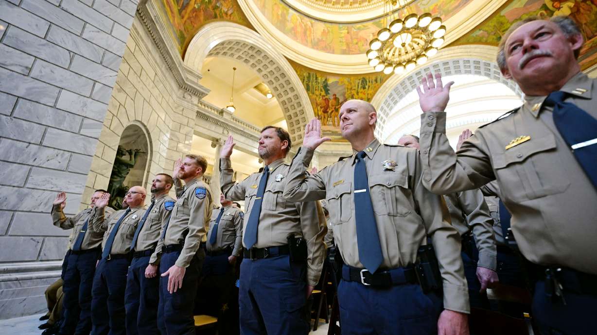 Members of the newly created Utah Department of Natural Resources Division of Law Enforcement are sworn in by Gov. Spencer Cox, at a ceremony at the state Capitol in Salt Lake City on Monday.