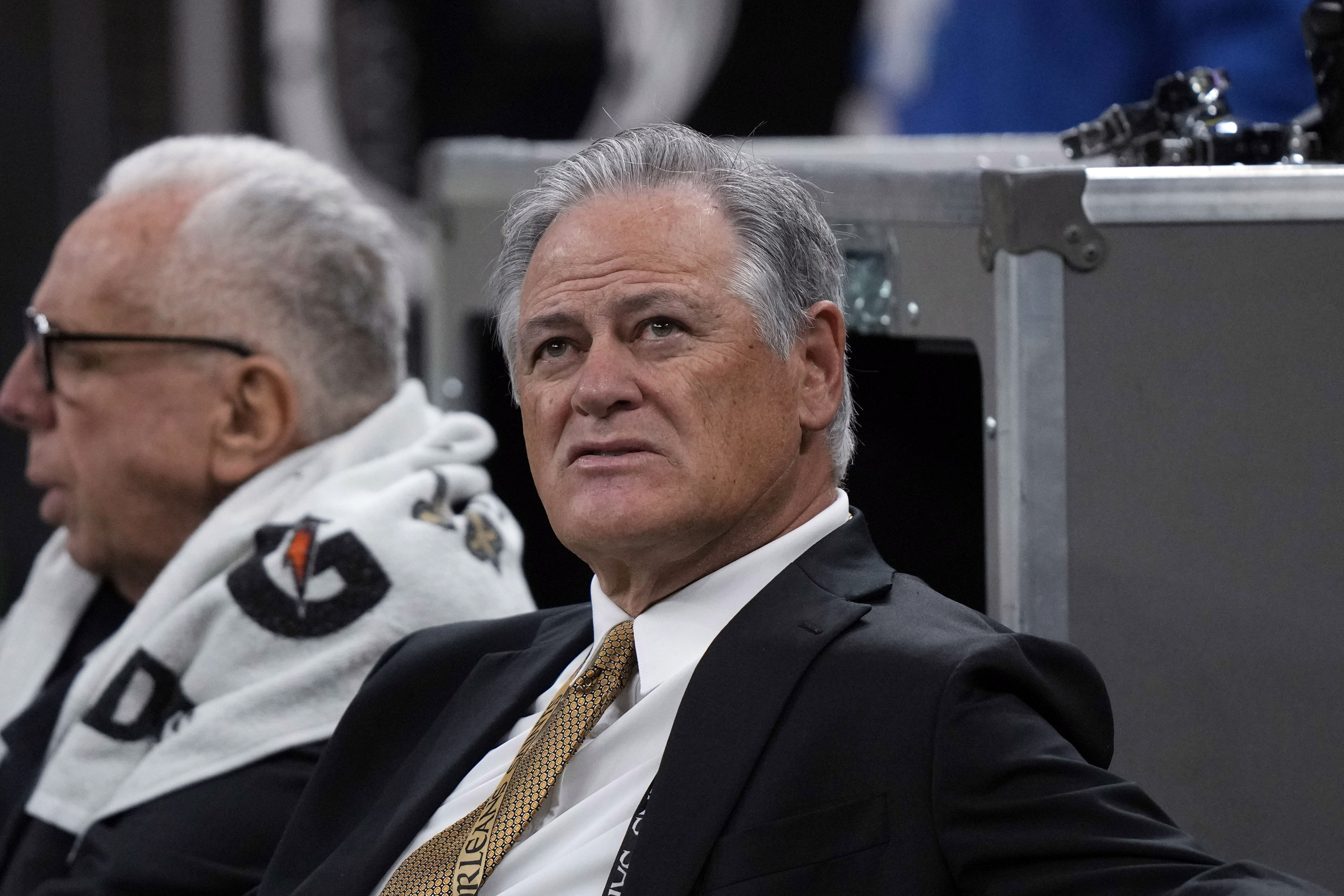 FILE - New Orleans Saints general manager Mickey Loomis sits on the bench before an NFL football game against the Atlanta Falcons in New Orleans, Dec. 18, 2022.