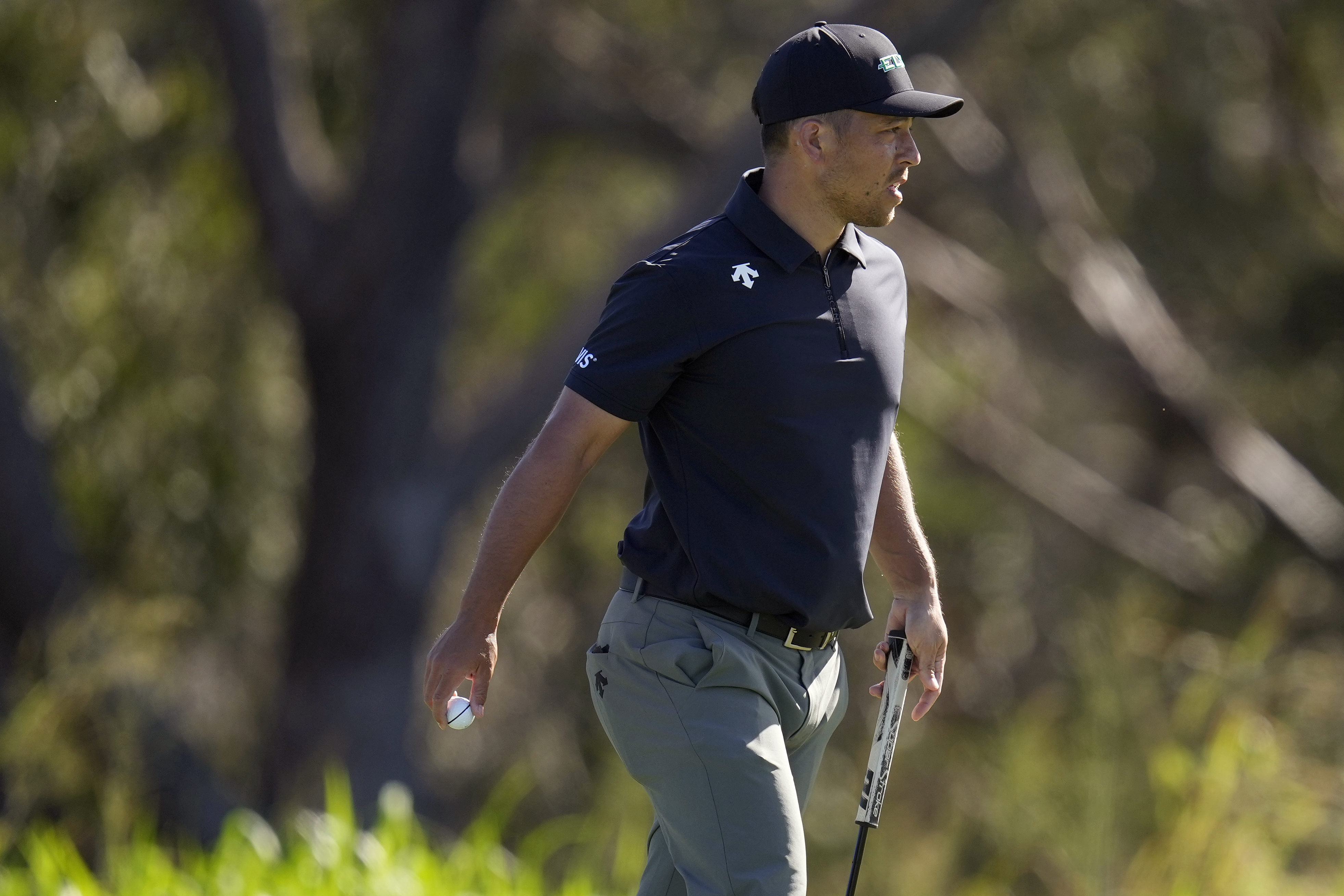 Xander Schauffele looks towards the gallery after his shot on the fourth green during the first round of The Sentry golf event, Thursday, Jan. 2, 2025, at Kapalua Plantation Course in Kapalua, Hawaii.