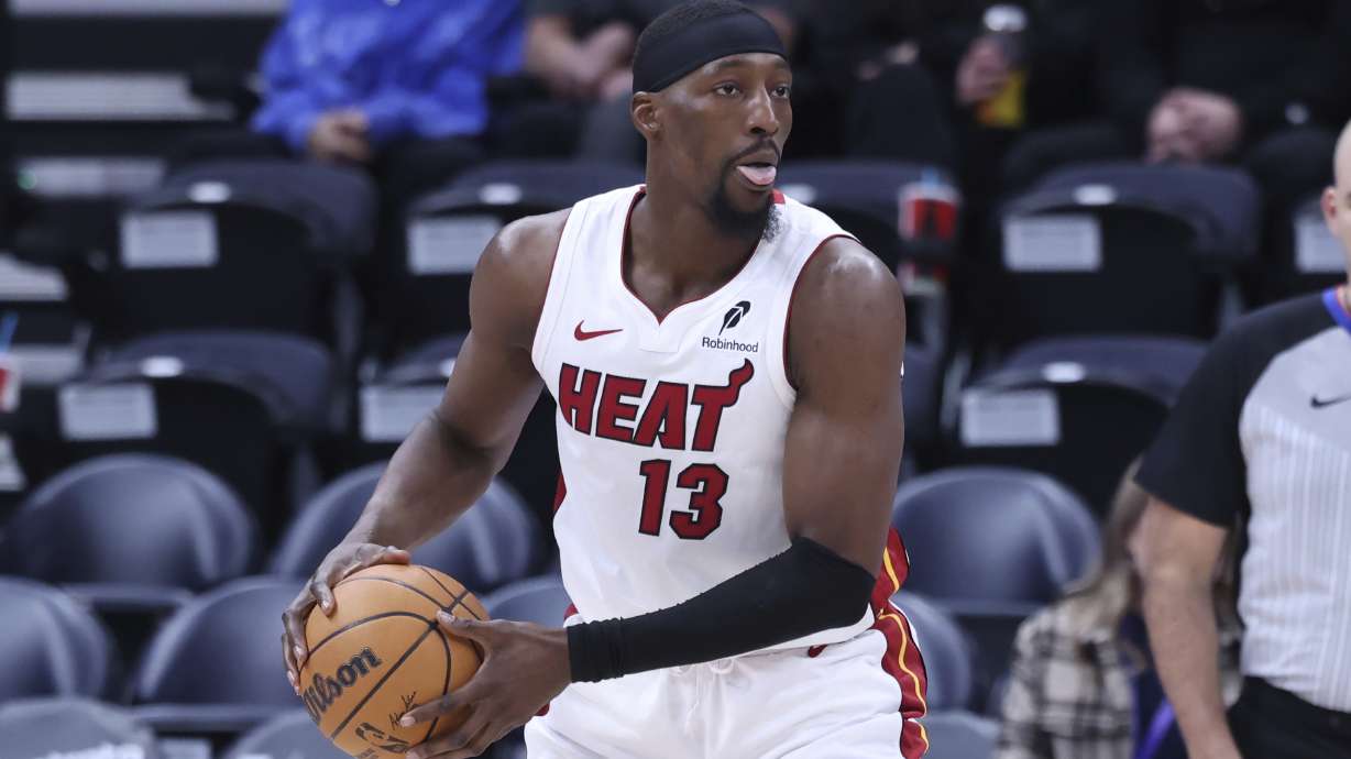 Miami Heat center Bam Adebayo (13) looks to pass the ball against the Utah Jazz during the second half of an NBA basketball game, Thursday, Jan. 9, 2025, in Salt Lake City.