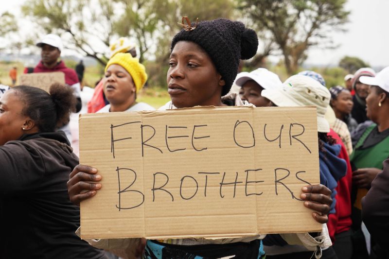 Relatives and friends protest near a reformed gold mineshaft where illegal miners are trapped in Stilfontein, South Africa, Nov. 15, 2024.