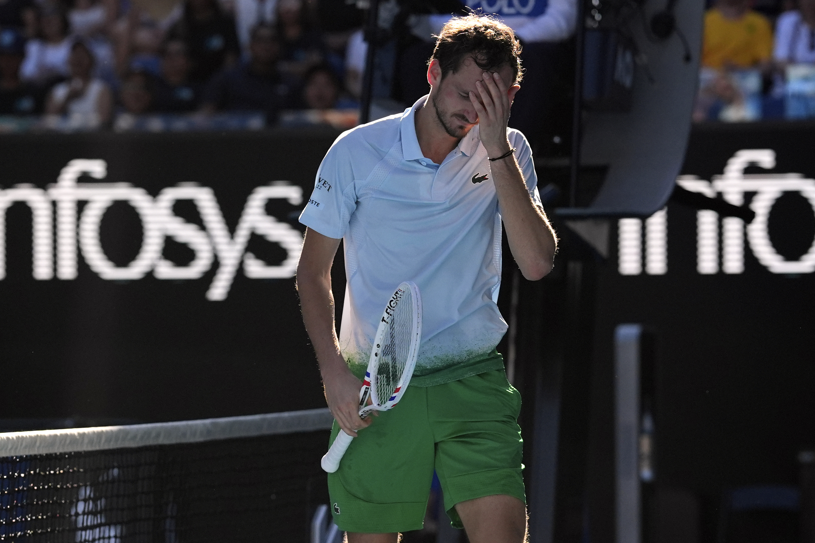 Daniil Medvedev destroys a TV camera attached to the net during his 5-set Australian Open win