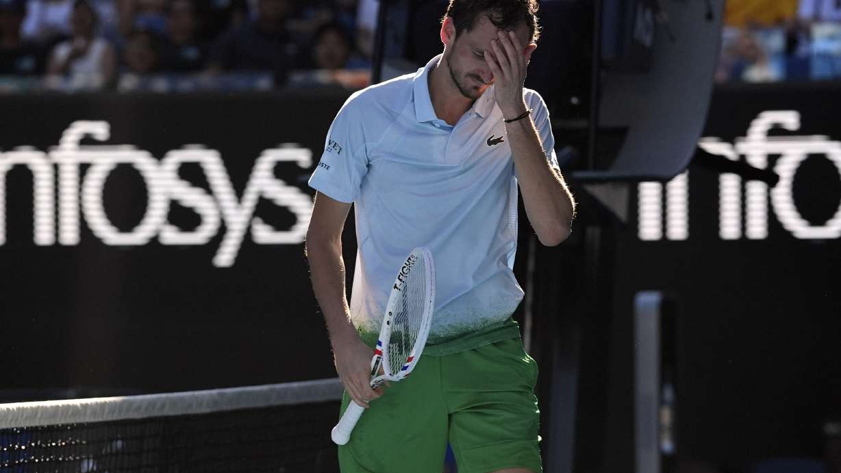 Daniil Medvedev of Russia reacts during his first round match against Kasidit Samrej of Thailand at the Australian Open tennis championship in Melbourne, Australia, Tuesday, Jan. 14, 2025.