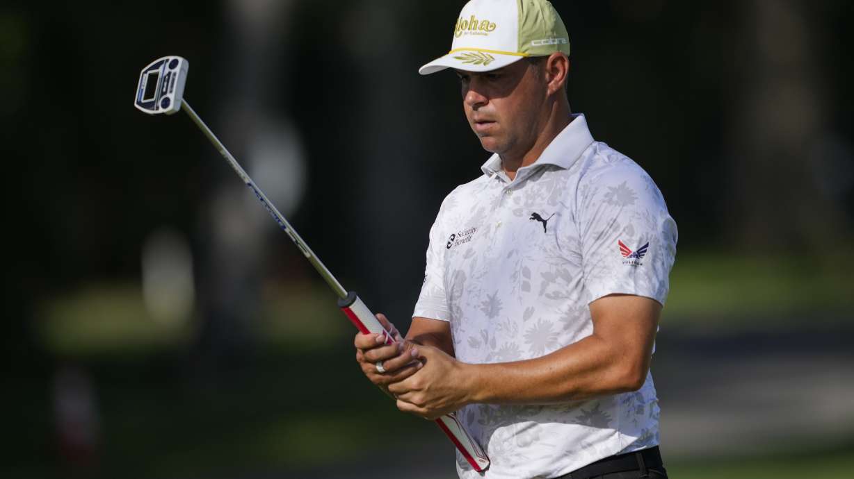 Gary Woodland lines up his shot on the ninth hole during the second round of the Sony Open golf event, Friday, Jan. 10, 2025, at Waialae Country Club in Honolulu.