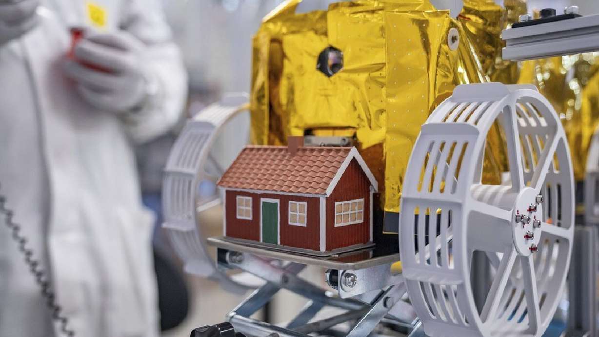 This photo provided by The Moonhouse project and taken in September 2024 at the ispace facilities in Japan, shows a model house created by artist Mikael Genberg and scheduled to be launched on Wednesday.
