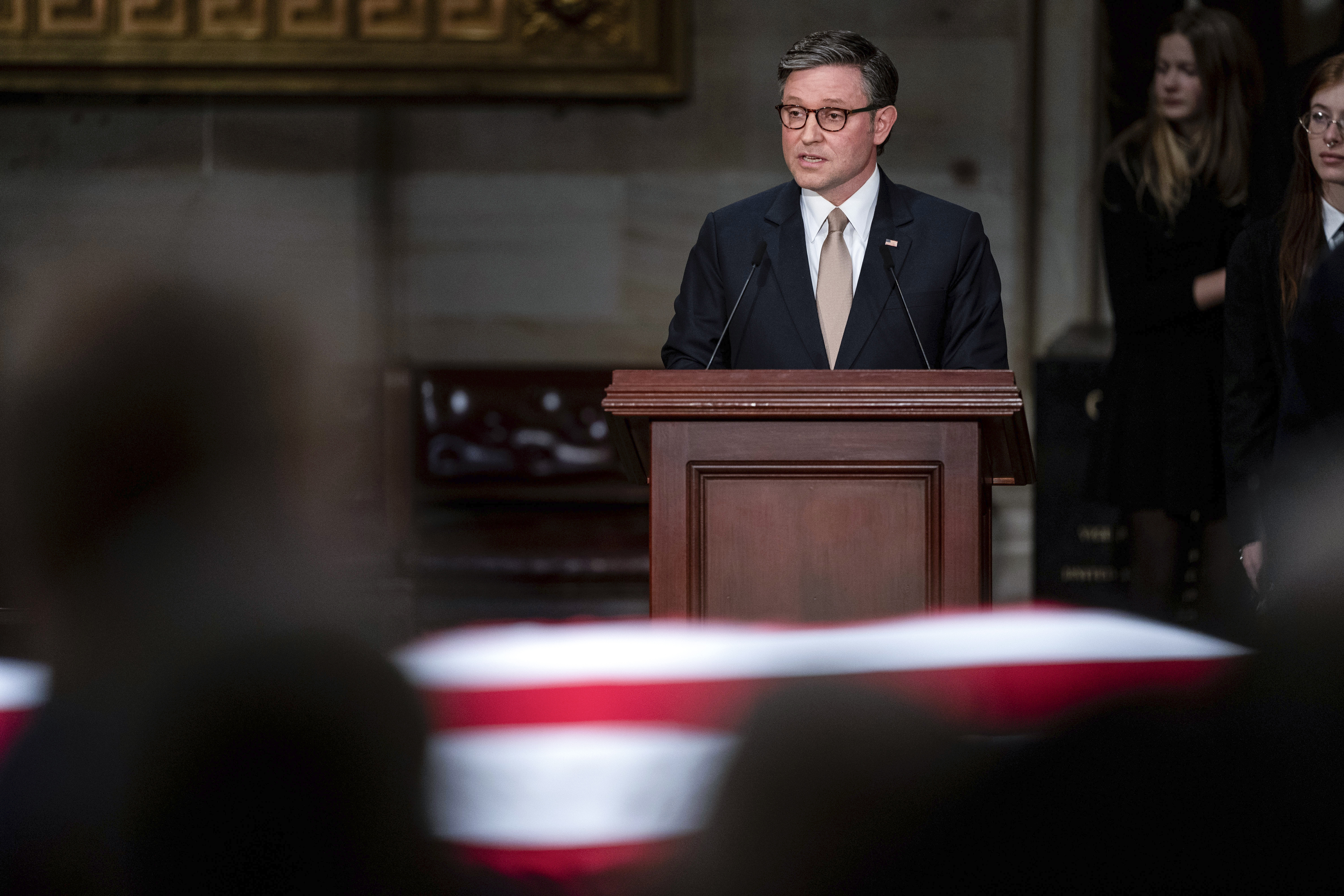 Speaker of the House Mike Johnson attends a ceremony for former President Jimmy Carter, at the Capitol, Jan. 7, in Washington. Johnson ordered that flags at the U.S. Capitol be raised to their full height on Inauguration Day.