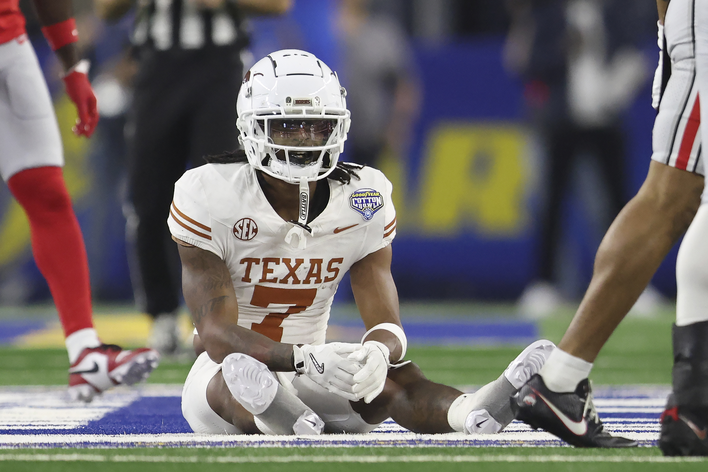 Texas wide receiver Isaiah Bond (7) reacts after an incomplete pass during the first half of the Cotton Bowl College Football Playoff semifinal game against Ohio State, Friday, Jan. 10, 2025, in Arlington, Texas. 