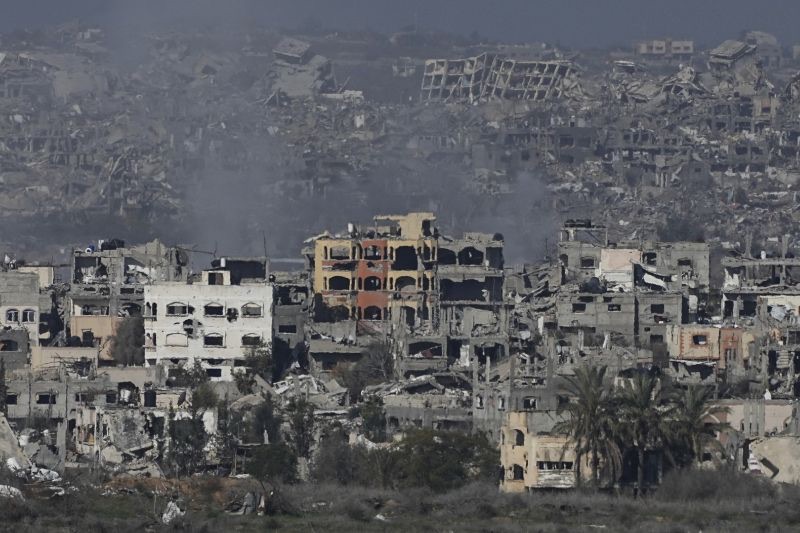 Destroyed buildings by Israeli bombardments are seen inside the Gaza Strip from southern Israel, on Tuesday.