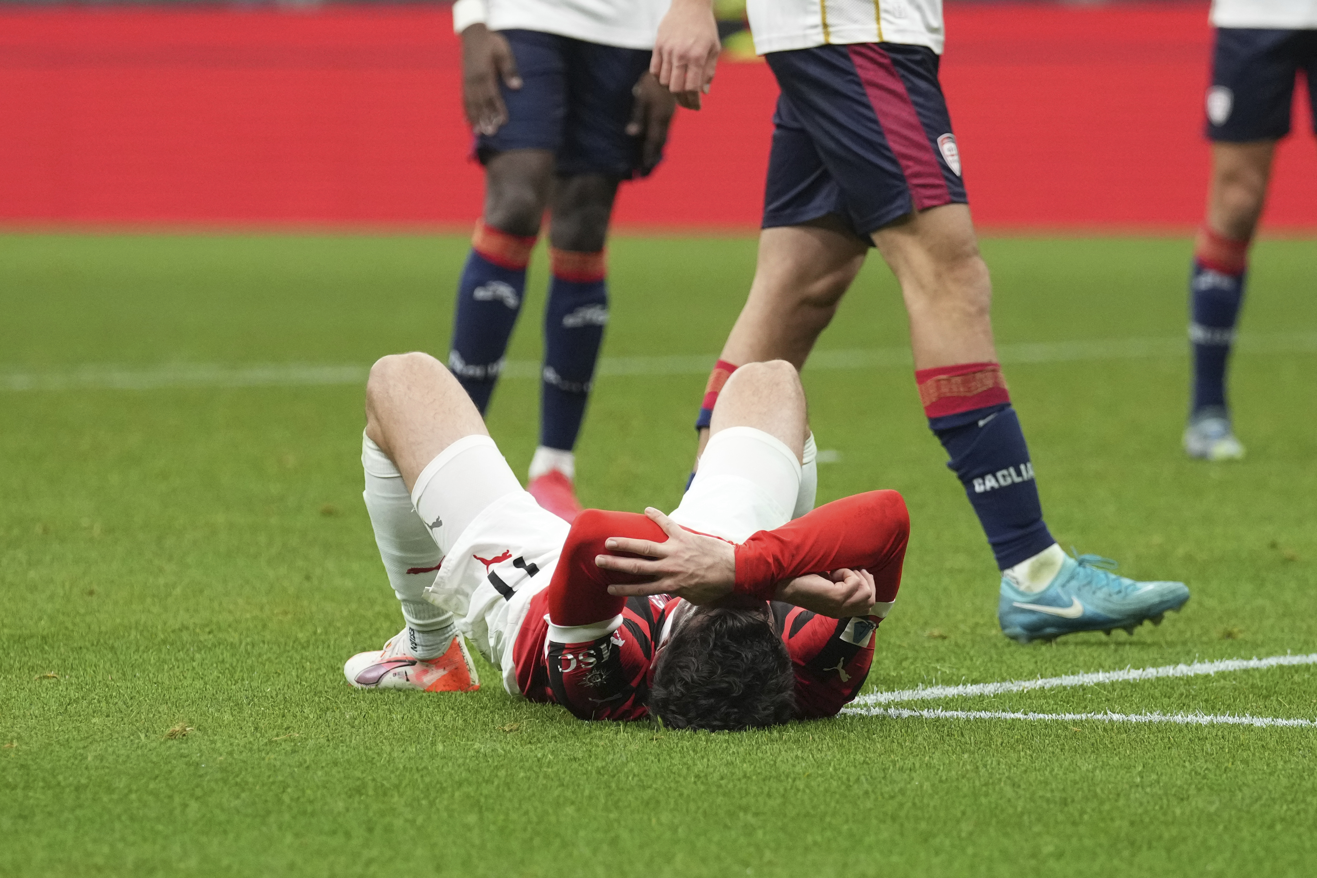 AC Milan's Christian Pulisic reacts after missing a chance to score during the Serie A soccer match between AC Milan and Cagliari at the San Siro stadium, in Milan, Italy, Saturday, Jan. 11, 2025.