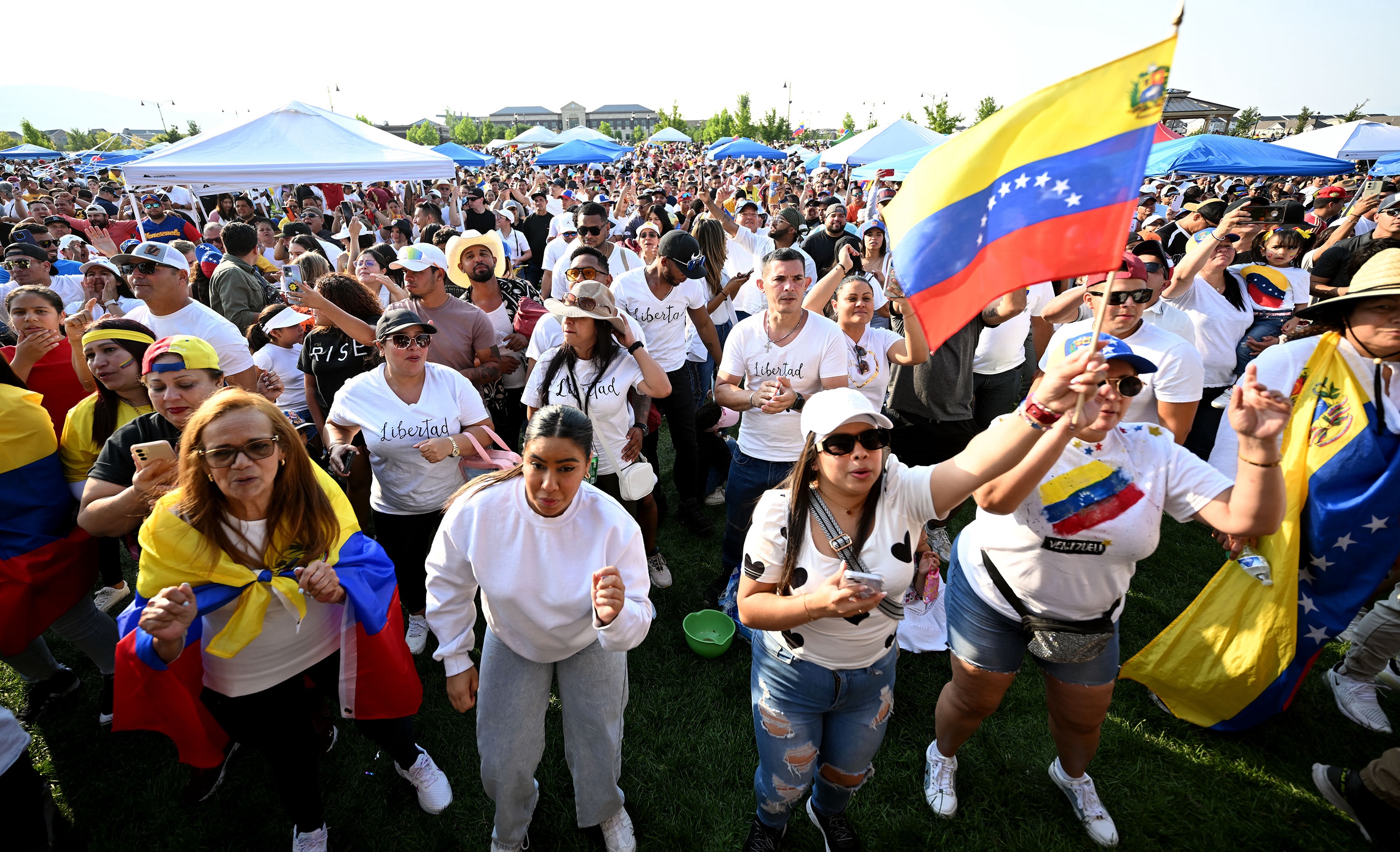 The Department of Homeland Security has extended the nation's temporary protected status designation. The July 28, 2024, photo shows Venezuelans marking presidential elections in their home country in Herriman.