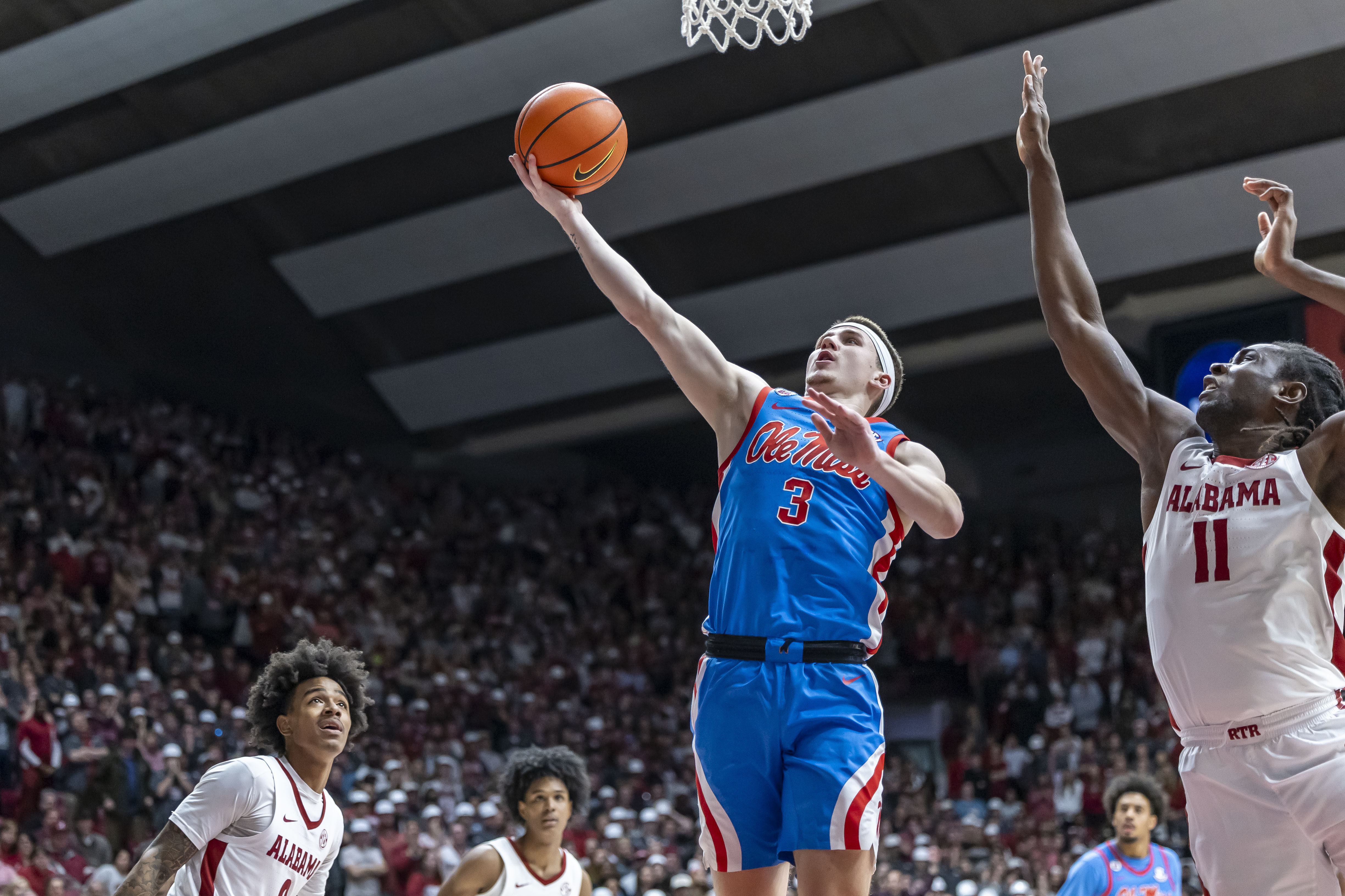 Malik Dia scores 23 points to lead No. 21 Mississippi over No. 4 Alabama 74-64