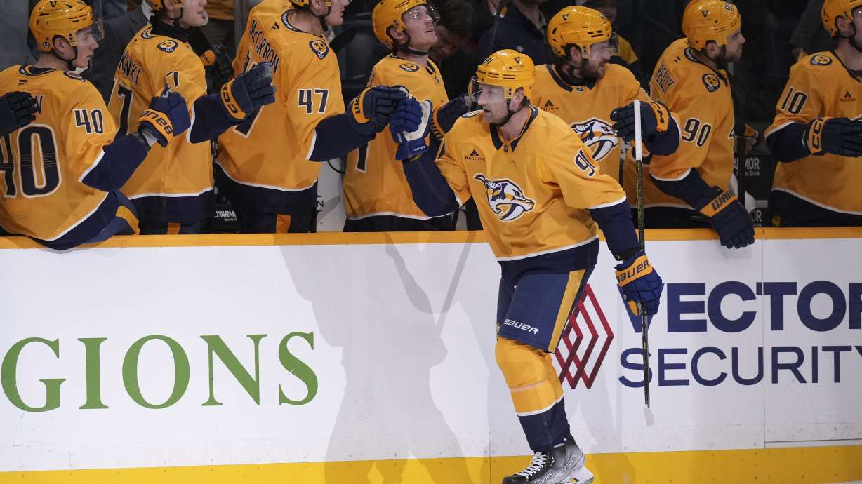 Nashville Predators center Steven Stamkos (91) celebrates his goal with teammates during the first period of an NHL hockey game against the Vegas Golden Knights, Tuesday, Jan. 14, 2025, in Nashville, Tenn.
