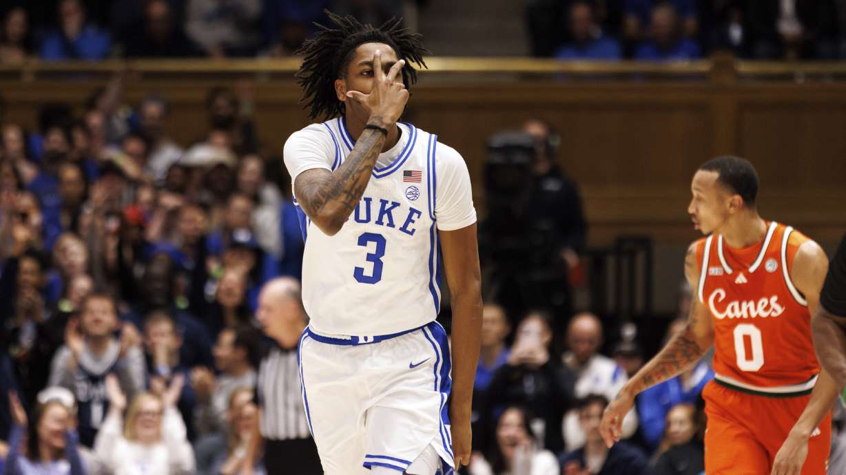 Duke's Isaiah Evans (3) reacts after hitting a 3-point shot during the first half of an NCAA college basketball game against Miami in Durham, N.C., Tuesday, Jan. 14, 2025.