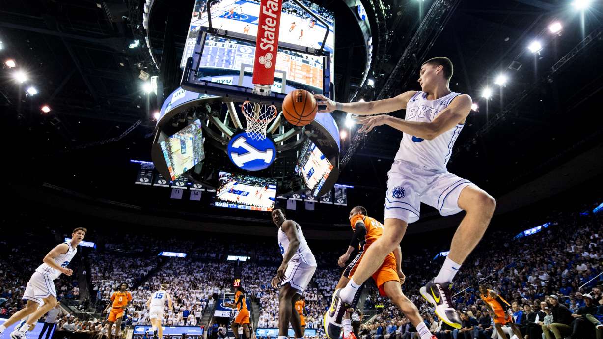 BYU Cougars guard Egor Demin (3) passes the ball inbounds as he goes out of bounds against the Oklahoma State Cowboys during an NCAA men’s basketball game held at the Marriott Center in Provo on Tuesday, Jan. 14, 2025.