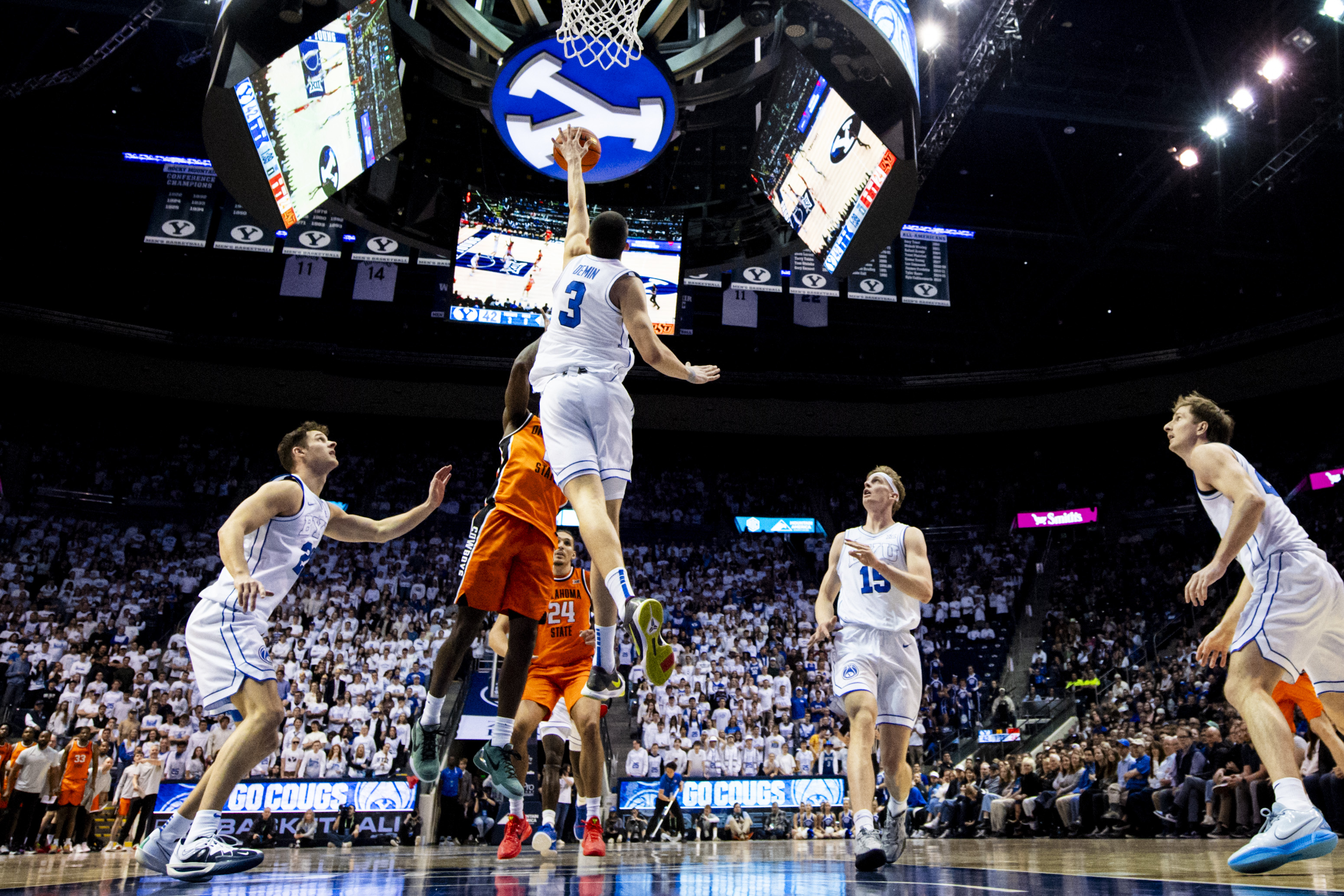 BYU Cougars guard Egor Demin (3) blocks a shot from Oklahoma State Cowboys guard Arturo Dean (2) during an NCAA men’s basketball game held at the Marriott Center in Provo on Tuesday, Jan. 14, 2025.