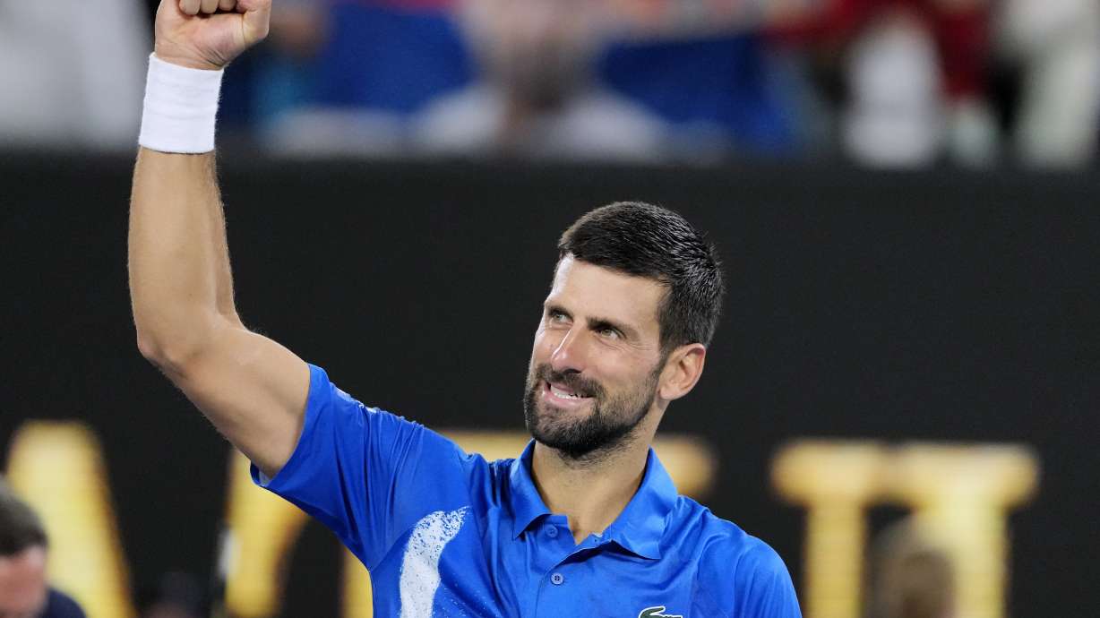 Novak Djokovic of Serbia celebrates after defeating Jaime Faria of Portugal in their second round match at the Australian Open tennis championship in Melbourne, Australia, Wednesday, Jan. 15, 2025.