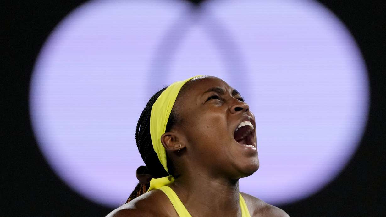Coco Gauff of the U.S. reacts after winning a point against Jodie Burrage of Britain during their second round match at the Australian Open tennis championship in Melbourne, Australia, Wednesday, Jan. 15, 2025.
