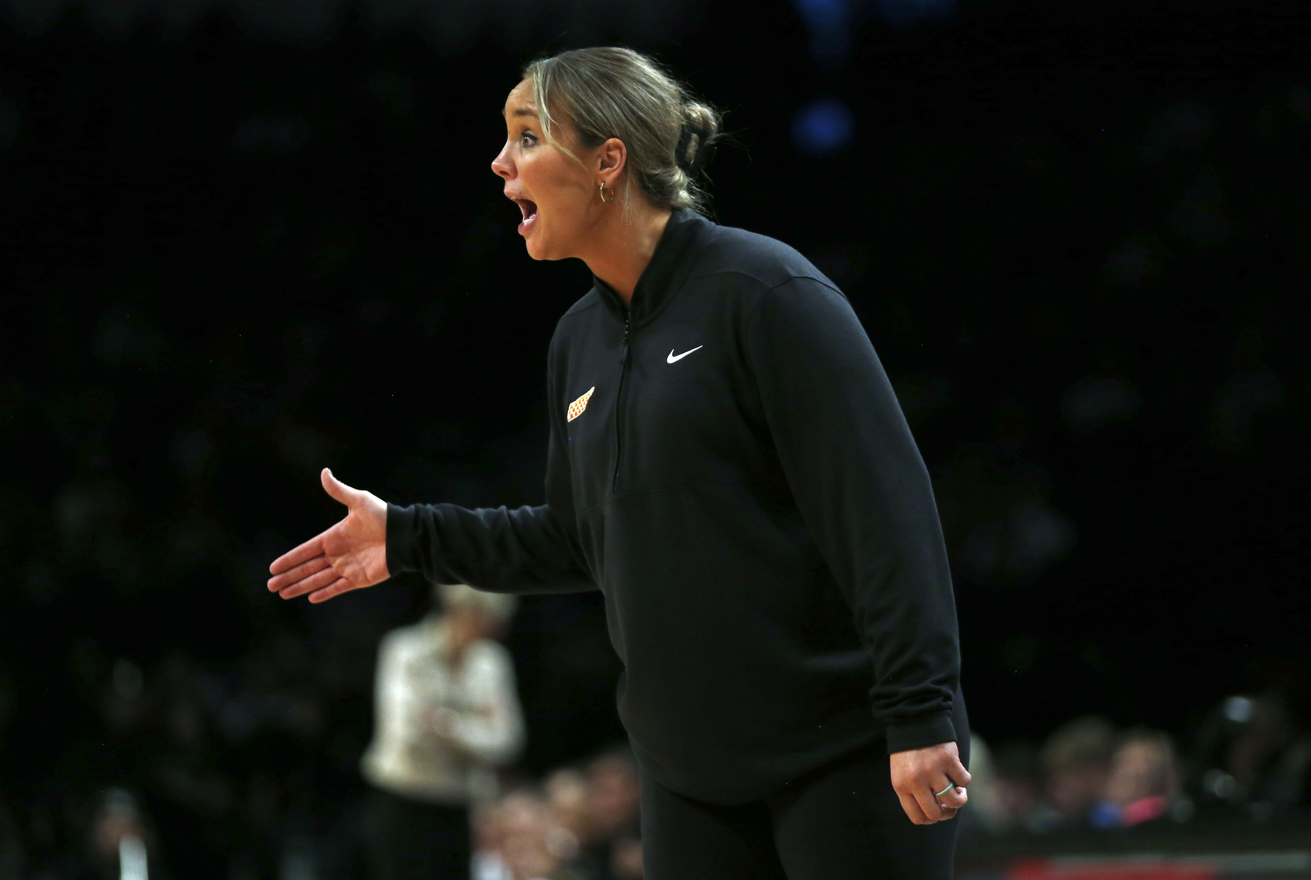 FILE - Tennessee head coach Kim Caldwell yells from the bench during the second half of an NCAA college basketball game against Iowa, Dec. 7, 2024, in New York.