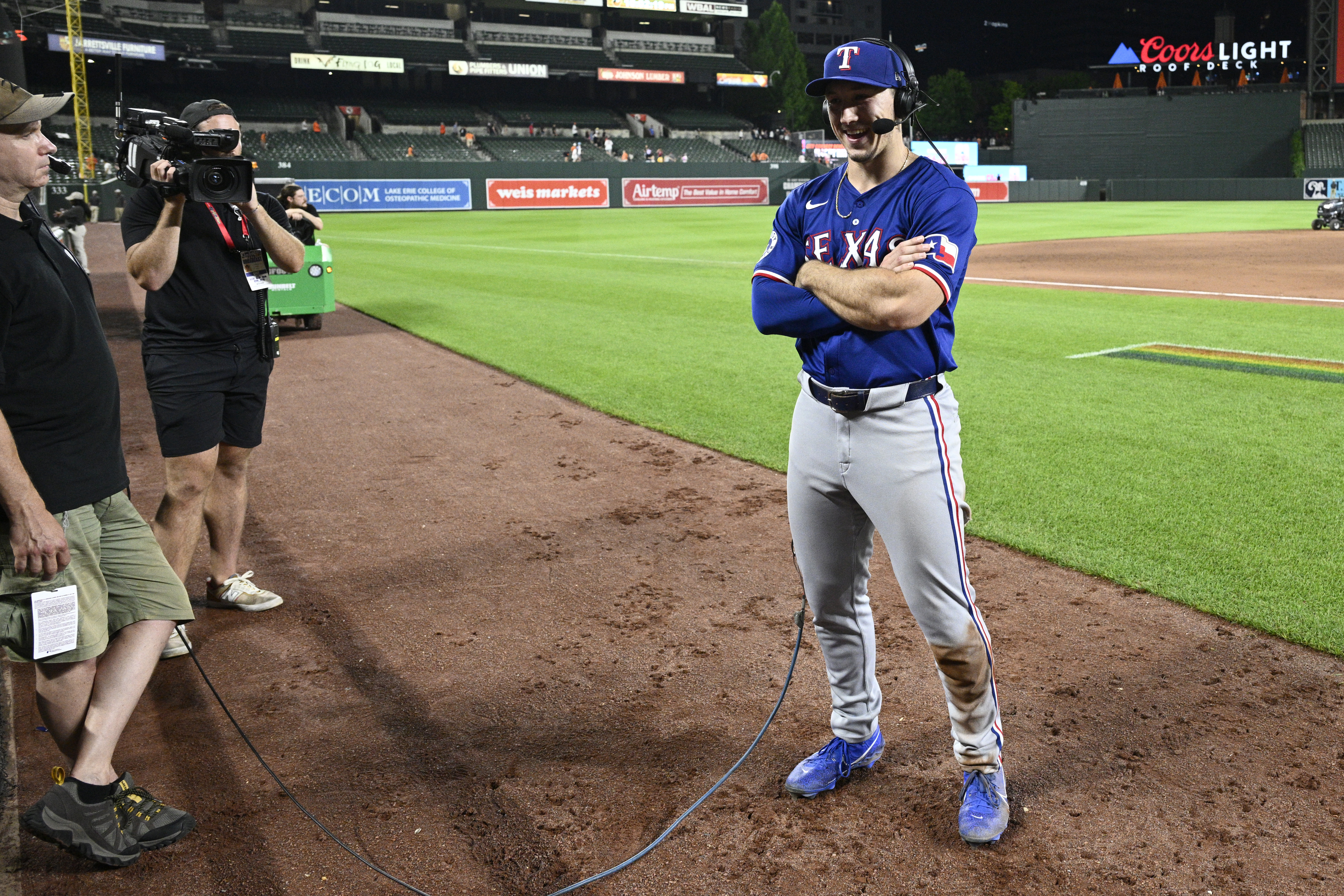 FILE - Texas Rangers' Wyatt Langford does post-game interview following a baseball game against the Baltimore Orioles, Sunday, June 30, 2024, in Baltimore.