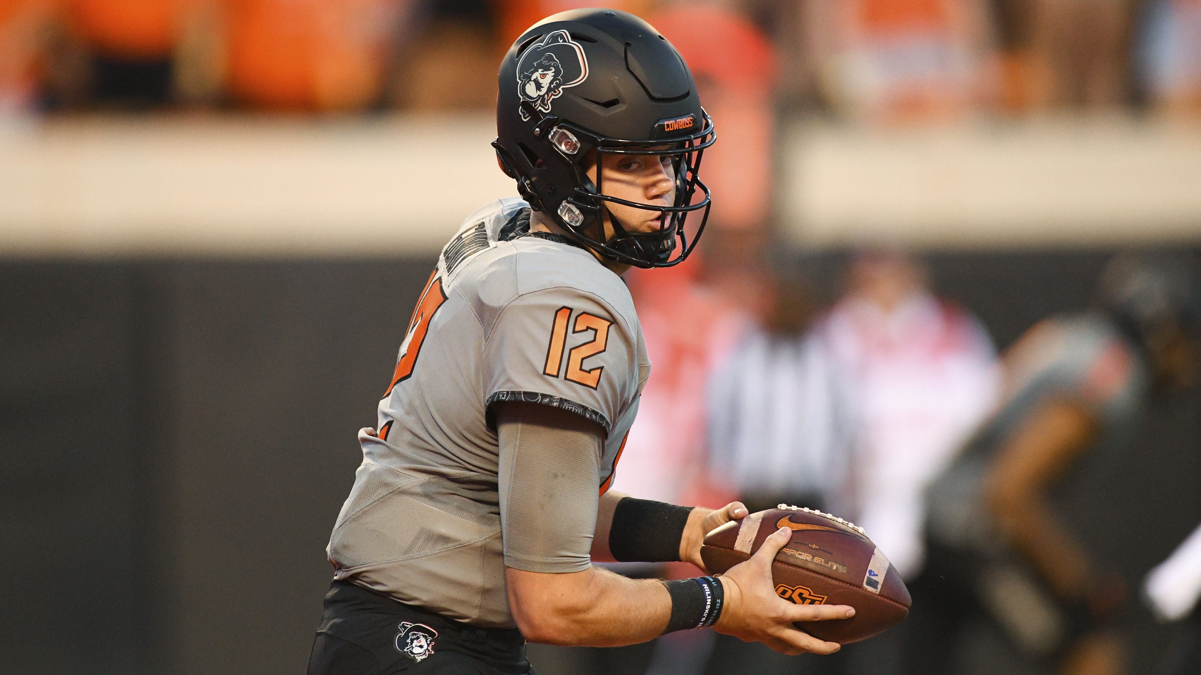 FILE - Oklahoma State quarterback Gunnar Gundy (12) prepares to handoff during an NCAA college football game, Sept. 17, 2022, in Stillwater, Okla.