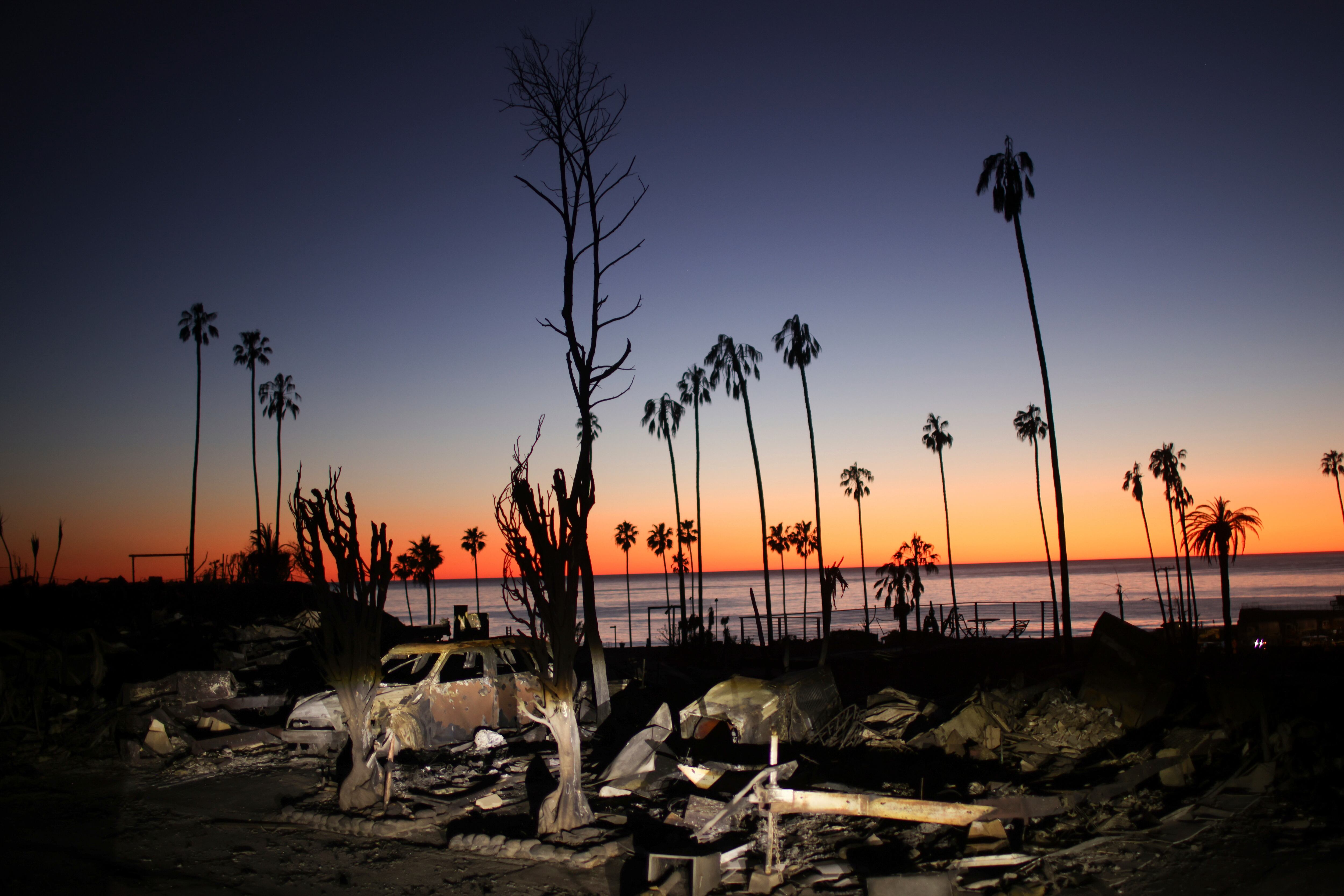 The devastation of the Palisades Fire is seen at sunset in the Pacific Palisades neighborhood of Los Angeles, Tuesday.