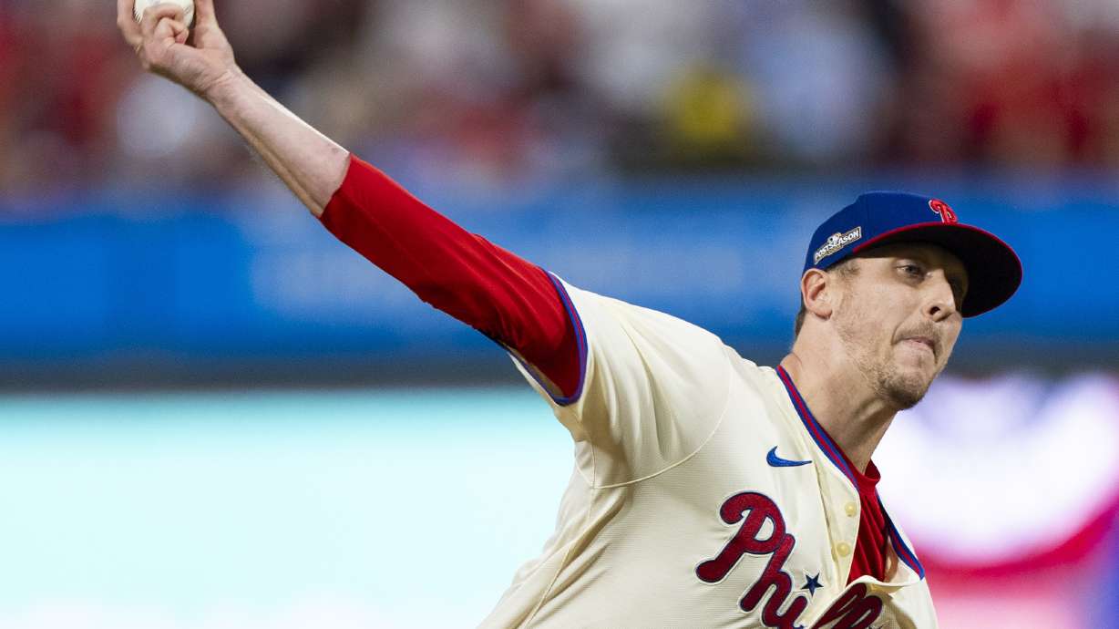 FILE - Philadelphia Phillies relief pitcher Jeff Hoffman delivers during Game 2 of a baseball NL Division Series against the New York Mets, Oct. 6, 2024, in Philadelphia.