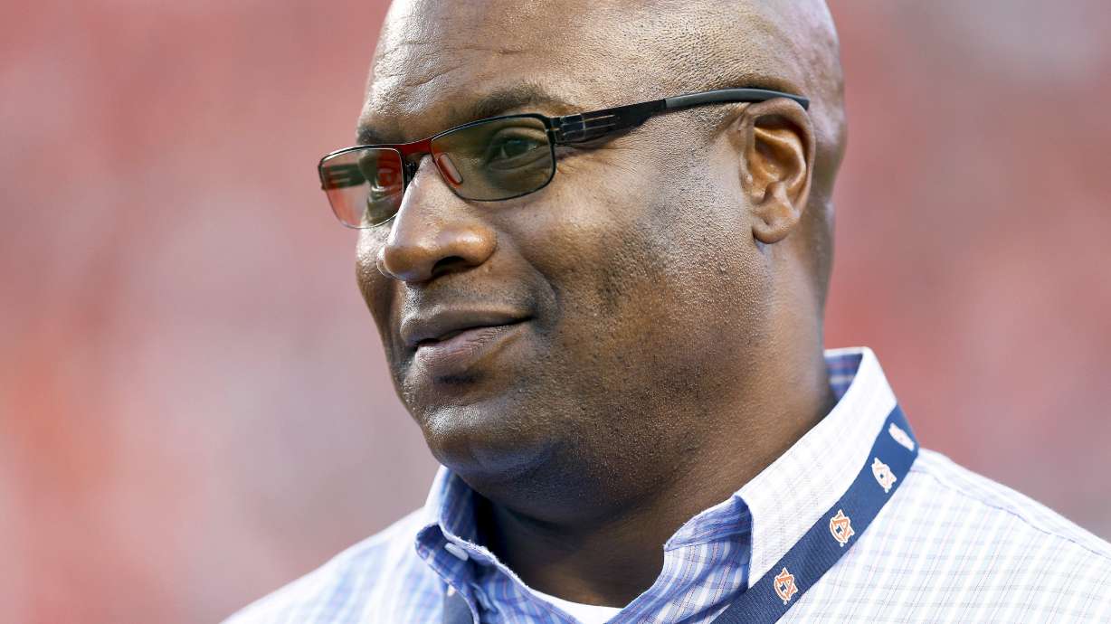 FILE - Former MLB and NFL player Bo Jackson, watches Auburn and Clemson practice before an NCAA college football game, Sept. 3, 2016, in Auburn, Ala.