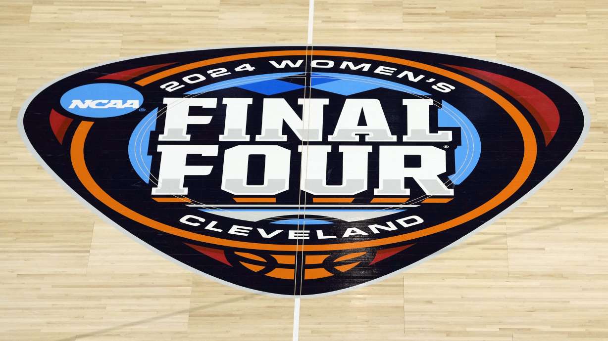 FILE - A person spins a basketball on their finger during South Carolina's practice for the NCAA Women's Final Four championship basketball game Saturday, April 6, 2024, in Cleveland.