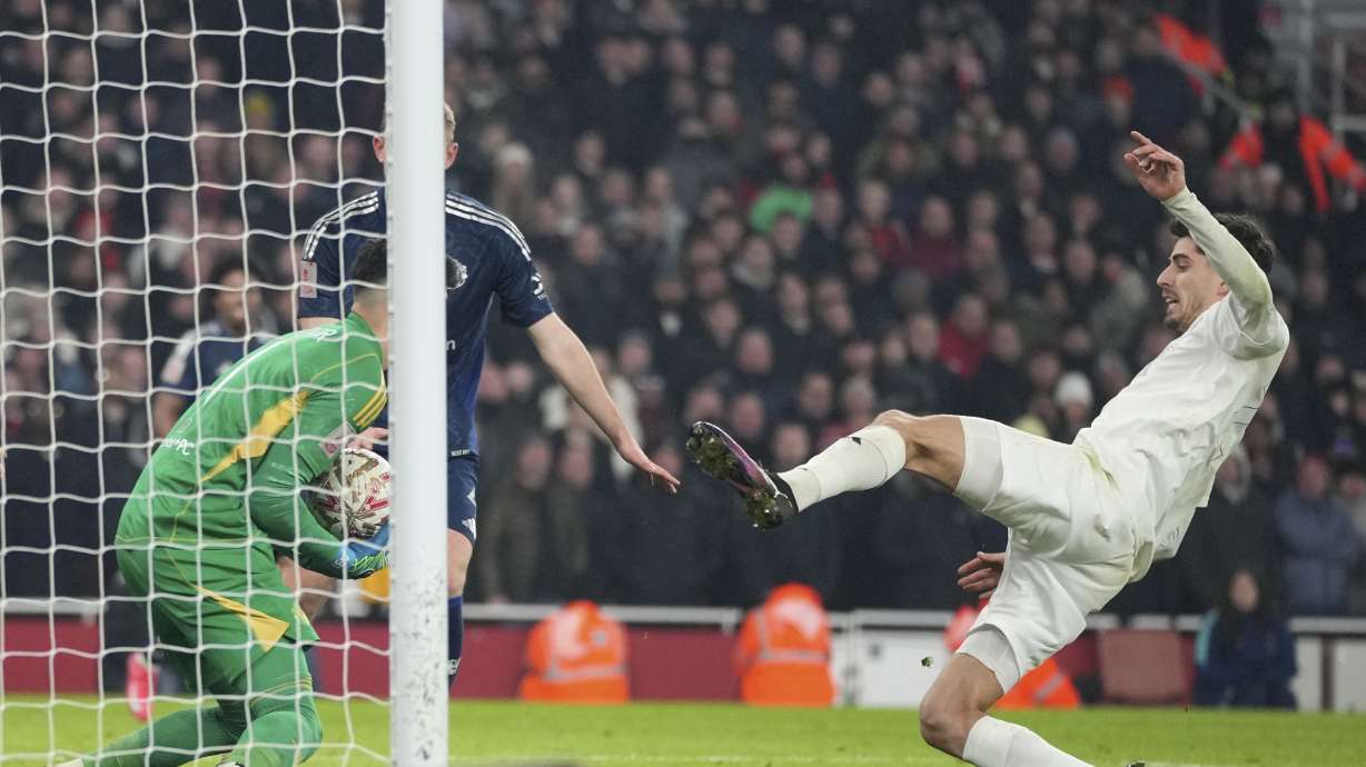 FILE - Arsenal's Kai Havertz, right, attempts a goal as Manchester United's goalkeeper Altay Bayindir saves its during the English FA Cup soccer match between Arsenal and Manchester United at the Emirates stadium in London, Sunday, Jan. 12, 2025.