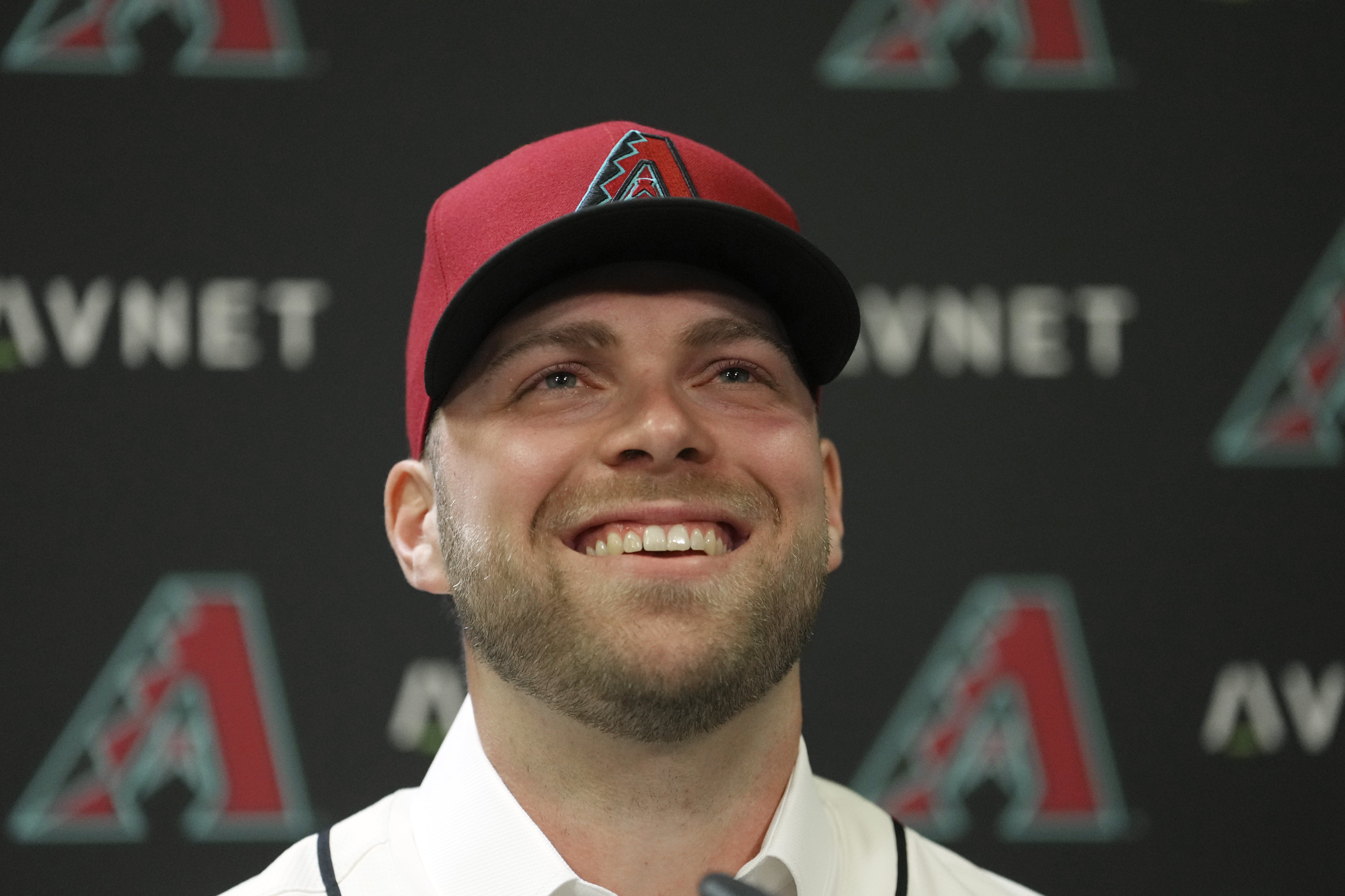 Arizona Diamondbacks new starting pitcher Corbin Burnes smiles as he is introduced during a news conference, Wednesday, Jan. 15, 2025, in Phoenix.
