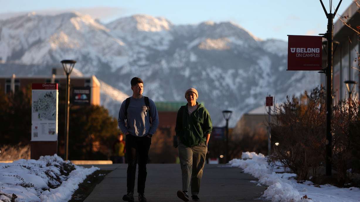 University of Utah sophomores Marcos Van Dalen and AJ Chanthamixay walk through the campus in Salt Lake City on Jan. 7. Universities are recruiting men who now account for just two out of five college degrees earned in the United States.