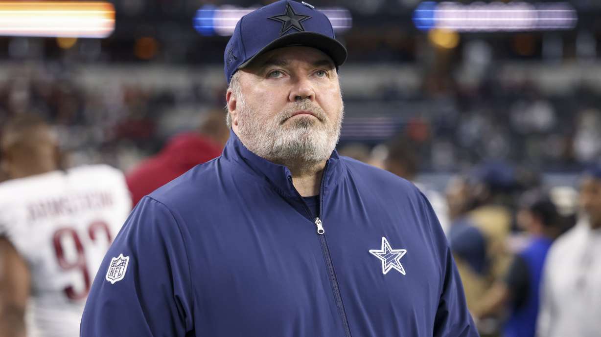 Dallas Cowboys head coach Mike McCarthy walks on the field following an NFL football game against the Washington Commanders, Sunday, Jan. 5, 2025, in Arlington, Texas. The Commanders won 23-19.