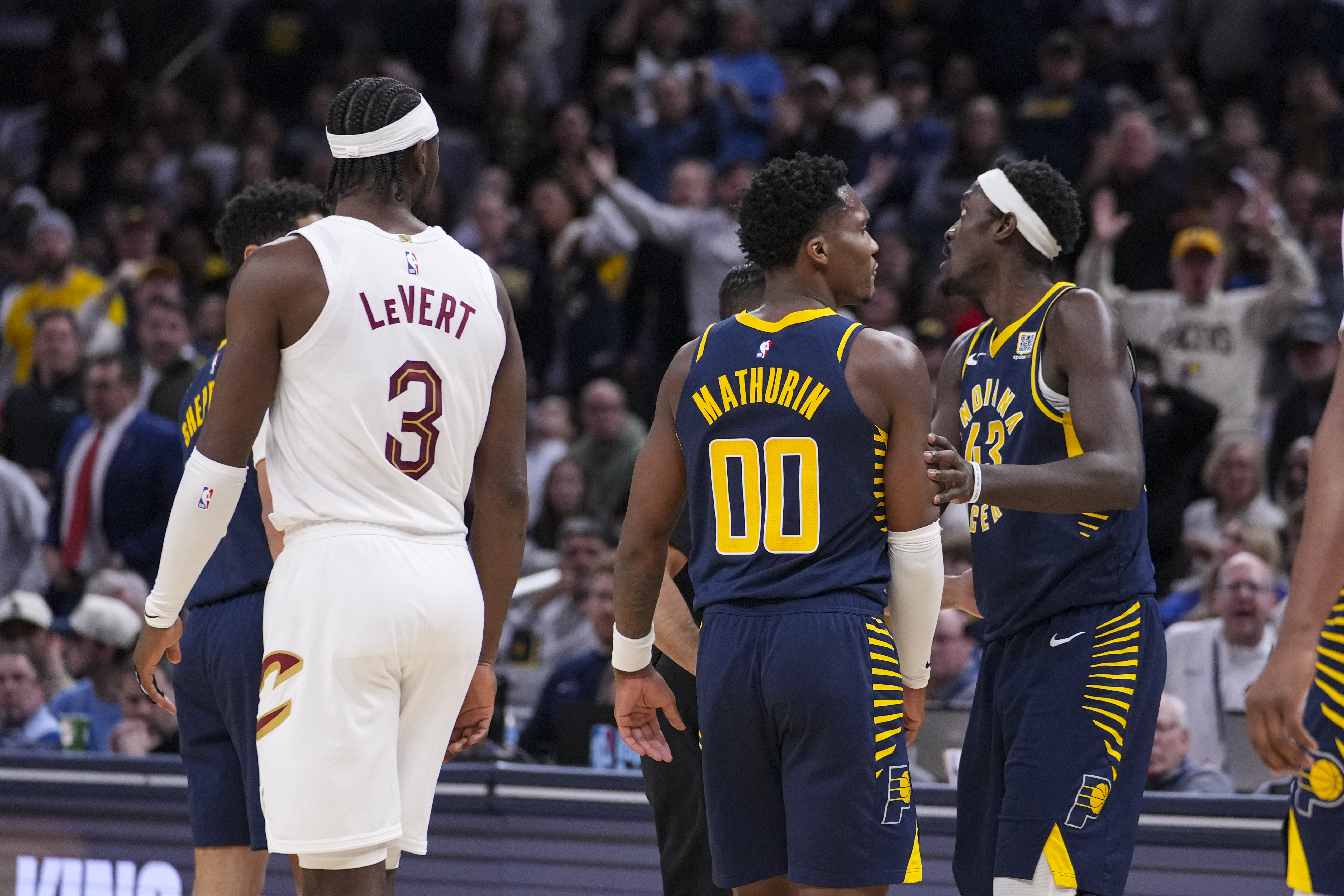 Indiana Pacers guard Bennedict Mathurin (00) is held by forward Pascal Siakam (43) after her received a technical foul against the Cleveland Cavaliers during the second half of an NBA basketball game in Indianapolis, Tuesday, Jan. 14, 2025.